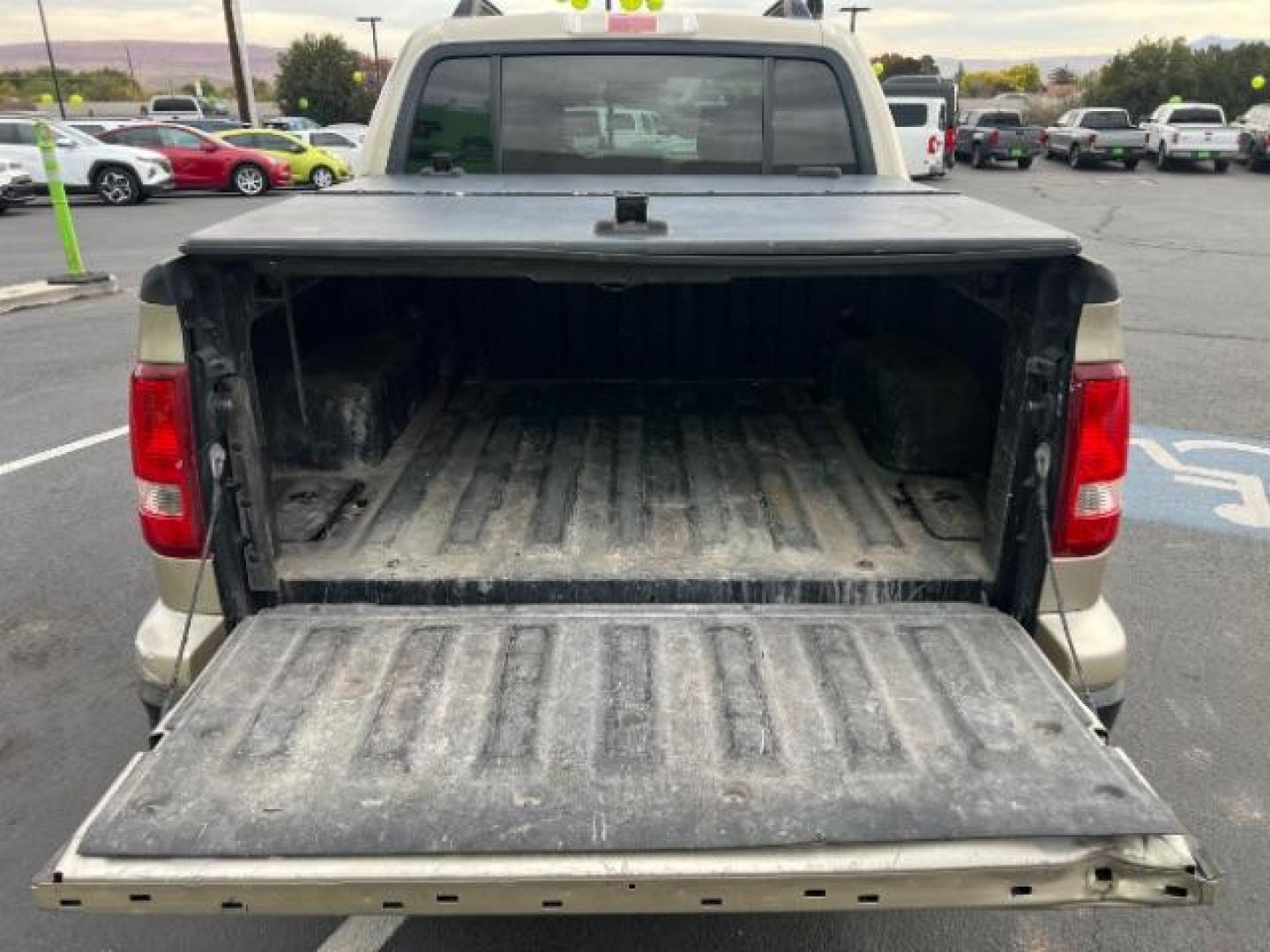 2007 Pueblo Gold Metallic /Camel Cloth Interior Ford Explorer Sport Trac XLT 4.0L 4WD (1FMEU51K07U) with an 4.0L V6 SOHC 12V FFV engine, 5-Speed Automatic transmission, located at 1865 East Red Hills Pkwy, St. George, 84770, (435) 628-0023, 37.120850, -113.543640 - We specialize in helping ALL people get the best financing available. No matter your credit score, good, bad or none we can get you an amazing rate. Had a bankruptcy, divorce, or repossessions? We give you the green light to get your credit back on the road. Low down and affordable payments that fit - Photo#23