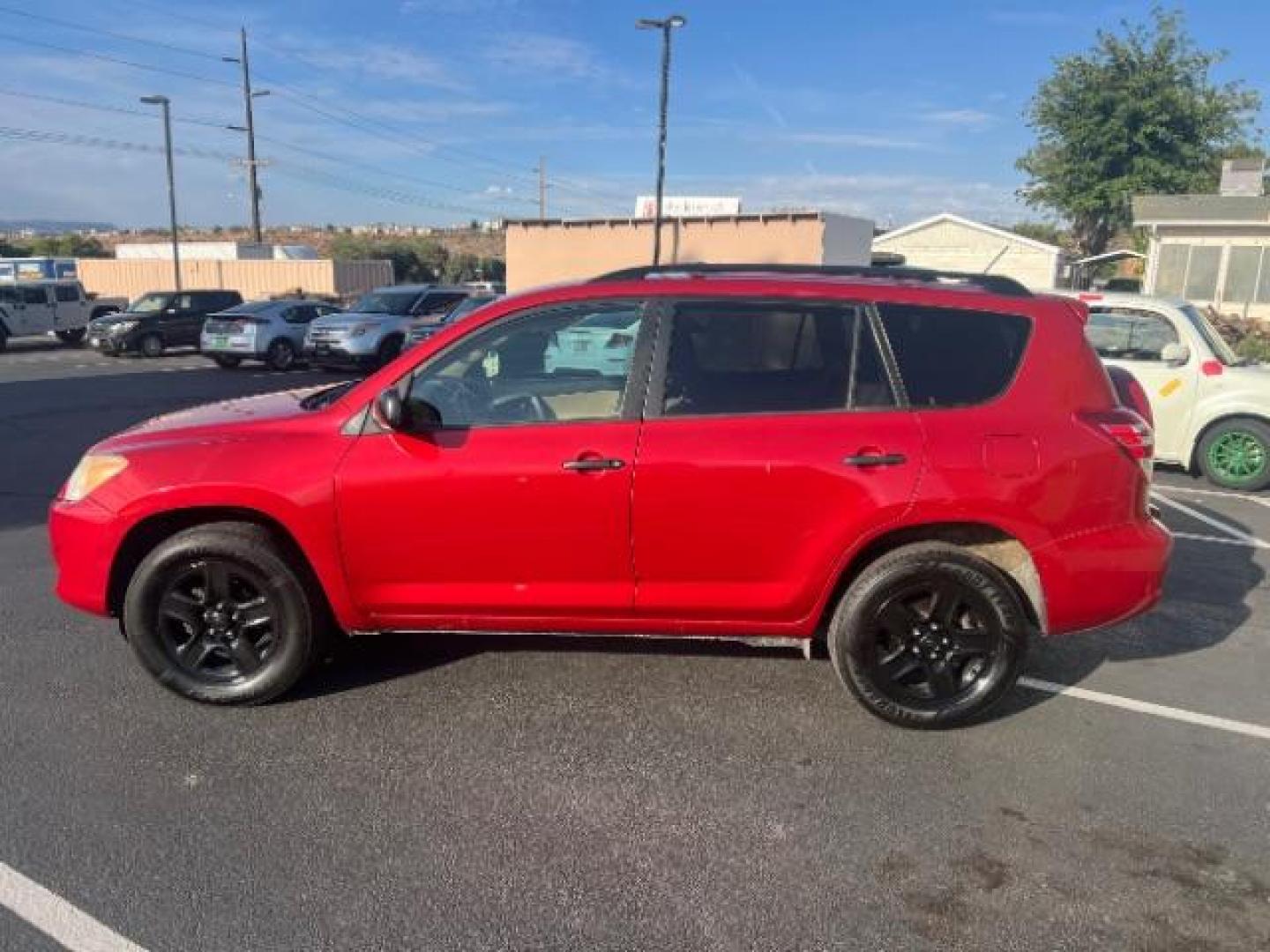 2011 Barcelona Red Metallic /Ash Cloth Interior Toyota RAV4 Base I4 2WD (2T3ZF4DVXBW) with an 2.4L L4 DOHC 16V engine, 4-Speed Automatic transmission, located at 940 North Main Street, Cedar City, UT, 84720, (435) 628-0023, 37.692936, -113.061897 - Photo#3