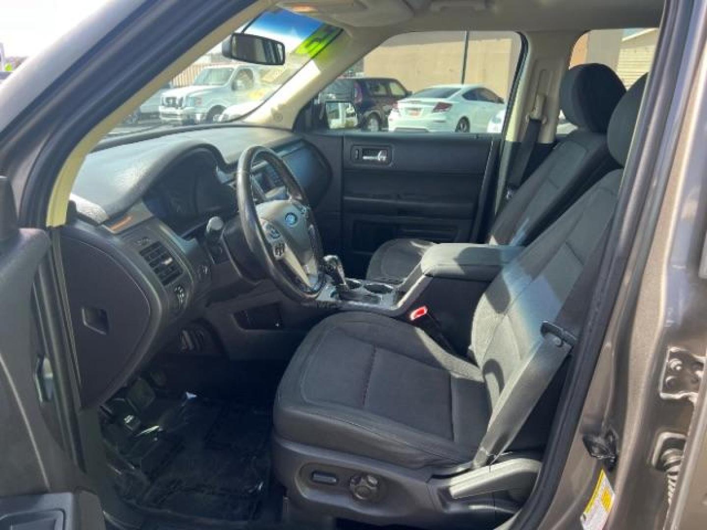 2013 Mineral Gray Metallic /Charcoal Black Cloth Interior Ford Flex SE FWD (2FMGK5B81DB) with an 3.5L V6 DOHC 24V engine, 6-Speed Automatic Overdrive transmission, located at 940 North Main Street, Cedar City, UT, 84720, (435) 628-0023, 37.692936, -113.061897 - We specialize in helping ALL people get the best financing available. No matter your credit score, good, bad or none we can get you an amazing rate. Had a bankruptcy, divorce, or repossessions? We give you the green light to get your credit back on the road. Low down and affordable payments that fit - Photo#14