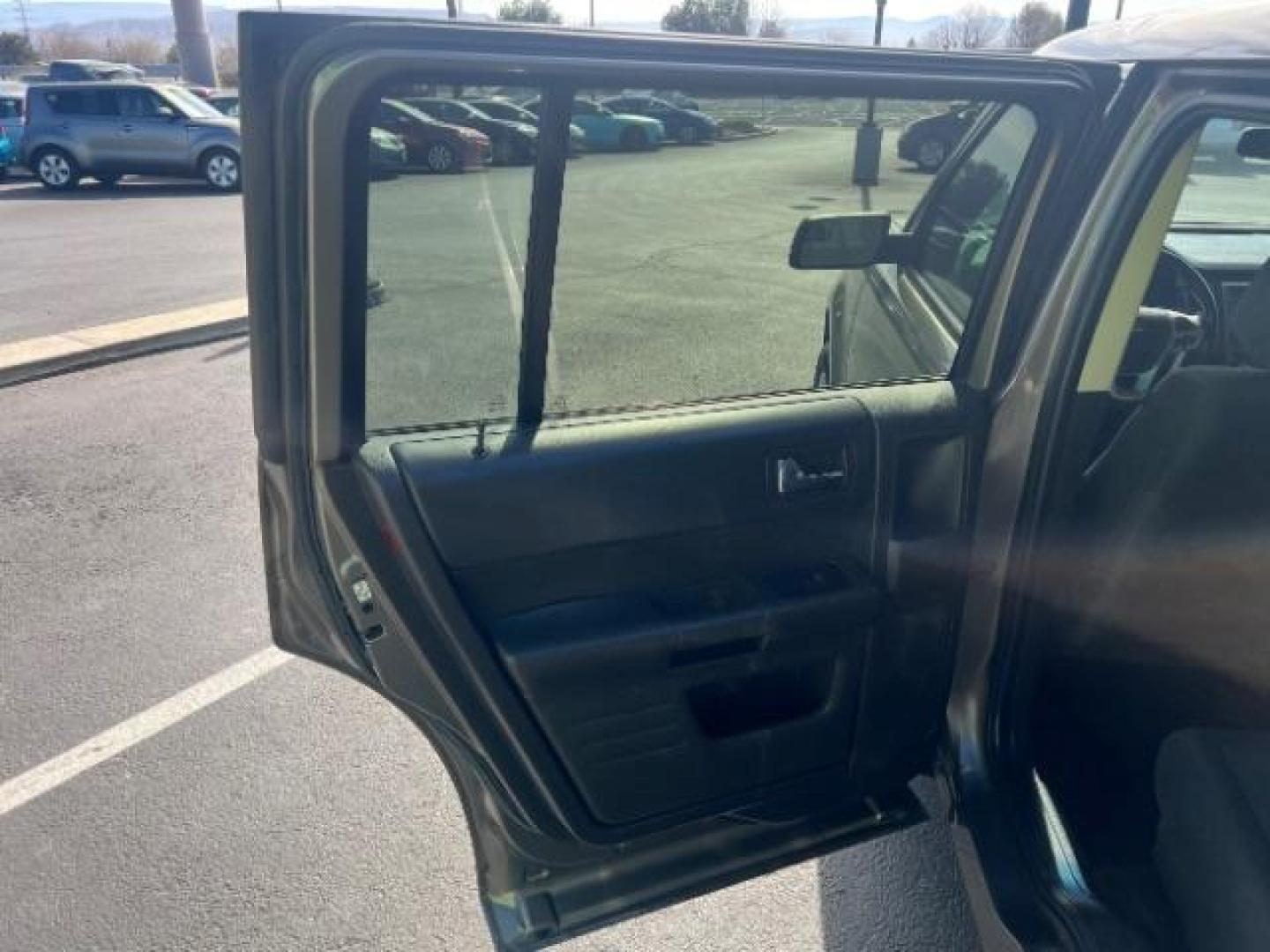 2013 Mineral Gray Metallic /Charcoal Black Cloth Interior Ford Flex SE FWD (2FMGK5B81DB) with an 3.5L V6 DOHC 24V engine, 6-Speed Automatic Overdrive transmission, located at 940 North Main Street, Cedar City, UT, 84720, (435) 628-0023, 37.692936, -113.061897 - We specialize in helping ALL people get the best financing available. No matter your credit score, good, bad or none we can get you an amazing rate. Had a bankruptcy, divorce, or repossessions? We give you the green light to get your credit back on the road. Low down and affordable payments that fit - Photo#20