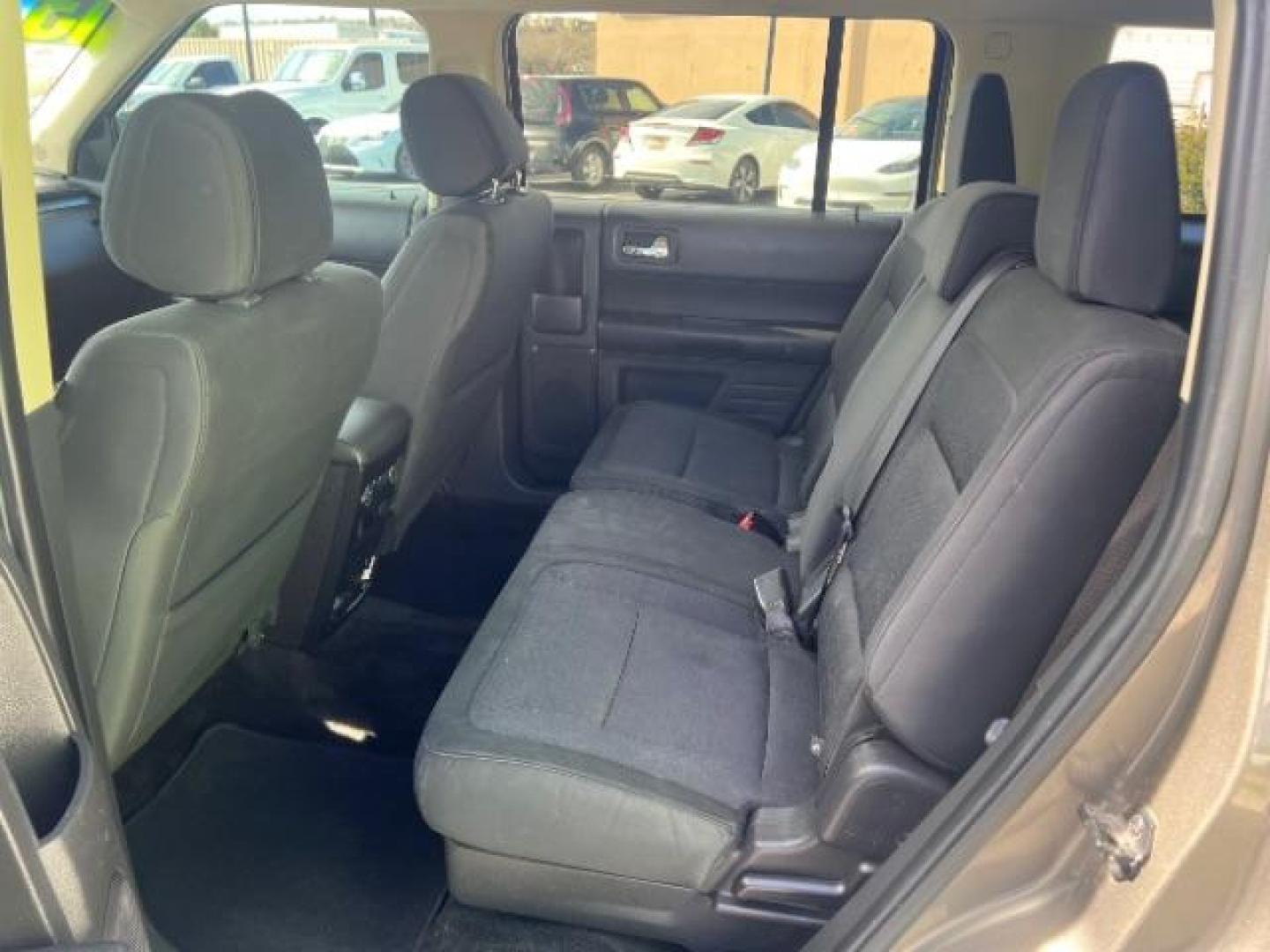 2013 Mineral Gray Metallic /Charcoal Black Cloth Interior Ford Flex SE FWD (2FMGK5B81DB) with an 3.5L V6 DOHC 24V engine, 6-Speed Automatic Overdrive transmission, located at 940 North Main Street, Cedar City, UT, 84720, (435) 628-0023, 37.692936, -113.061897 - We specialize in helping ALL people get the best financing available. No matter your credit score, good, bad or none we can get you an amazing rate. Had a bankruptcy, divorce, or repossessions? We give you the green light to get your credit back on the road. Low down and affordable payments that fit - Photo#21