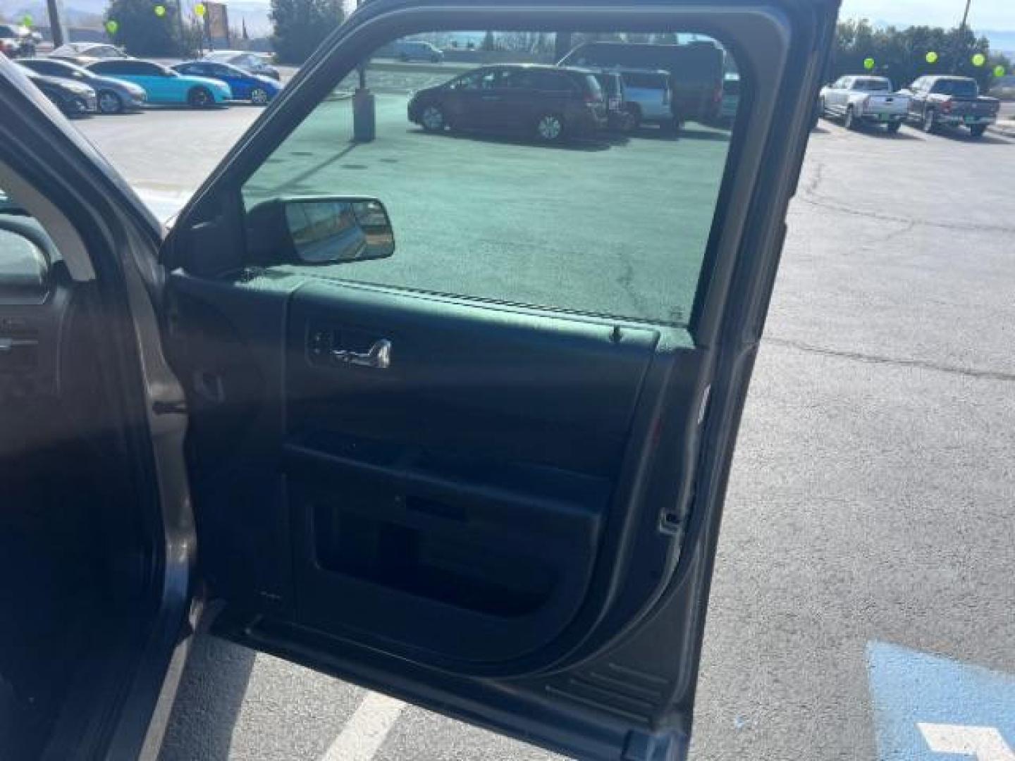 2013 Mineral Gray Metallic /Charcoal Black Cloth Interior Ford Flex SE FWD (2FMGK5B81DB) with an 3.5L V6 DOHC 24V engine, 6-Speed Automatic Overdrive transmission, located at 940 North Main Street, Cedar City, UT, 84720, (435) 628-0023, 37.692936, -113.061897 - We specialize in helping ALL people get the best financing available. No matter your credit score, good, bad or none we can get you an amazing rate. Had a bankruptcy, divorce, or repossessions? We give you the green light to get your credit back on the road. Low down and affordable payments that fit - Photo#30