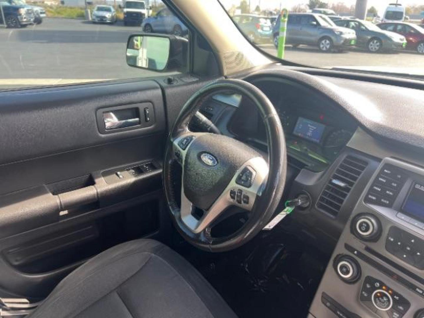 2013 Mineral Gray Metallic /Charcoal Black Cloth Interior Ford Flex SE FWD (2FMGK5B81DB) with an 3.5L V6 DOHC 24V engine, 6-Speed Automatic Overdrive transmission, located at 940 North Main Street, Cedar City, UT, 84720, (435) 628-0023, 37.692936, -113.061897 - We specialize in helping ALL people get the best financing available. No matter your credit score, good, bad or none we can get you an amazing rate. Had a bankruptcy, divorce, or repossessions? We give you the green light to get your credit back on the road. Low down and affordable payments that fit - Photo#33
