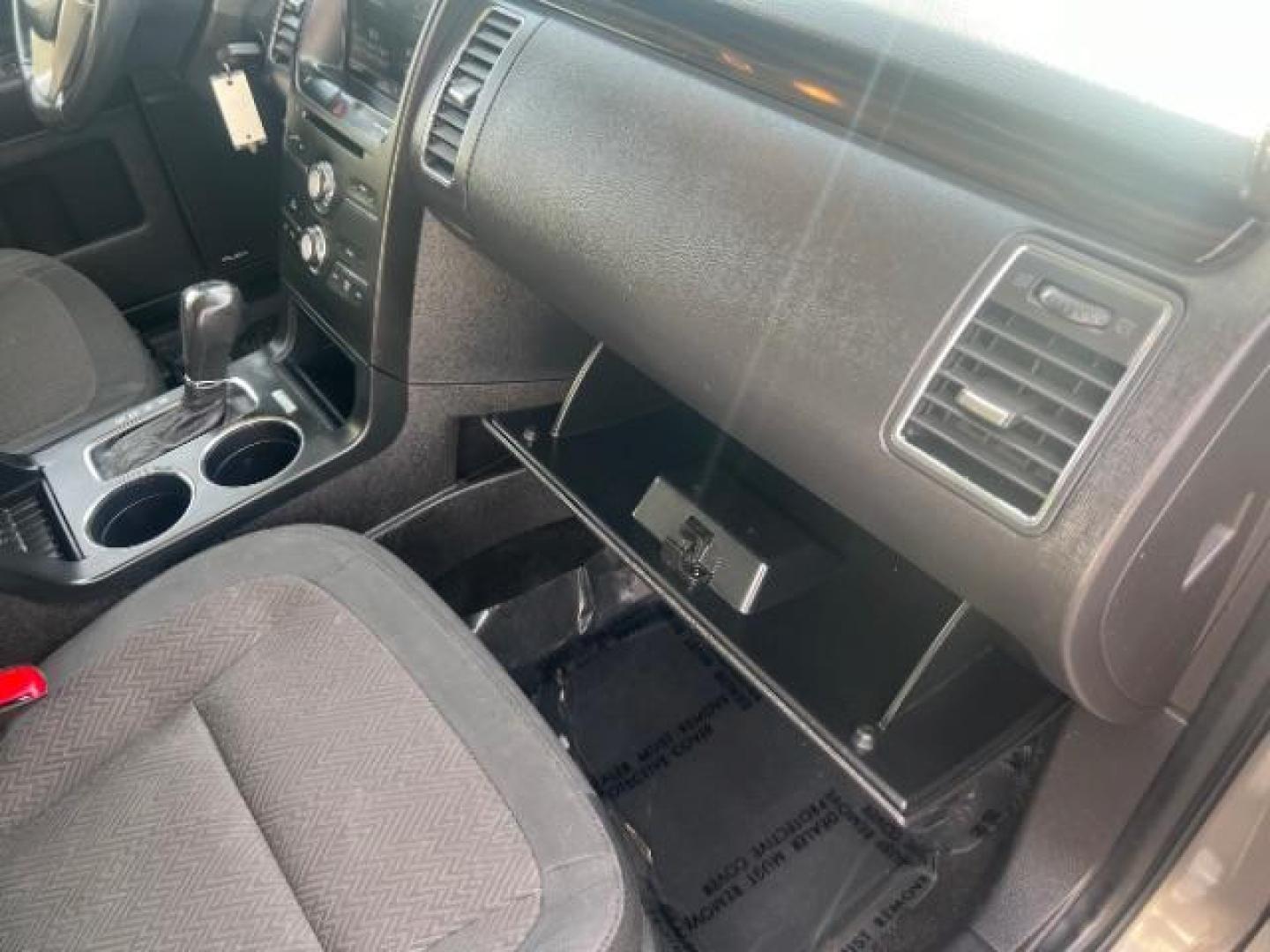 2013 Mineral Gray Metalli /Charcoal Black Cloth Ford Flex SEL FWD (2FMGK5C88DB) with an 3.5L V6 DOHC 24V engine, 6-Speed Automatic Ov transmission, located at 1865 East Red Hills Pkwy, St. George, 84770, (435) 628-0023, 37.120850, -113.543640 - We specialize in helping ALL people get the best financing available. No matter your credit score, good, bad or none we can get you an amazing rate. Had a bankruptcy, divorce, or repossessions? We give you the green light to get your credit back on the road. Low down and affordable payments that fit - Photo#34