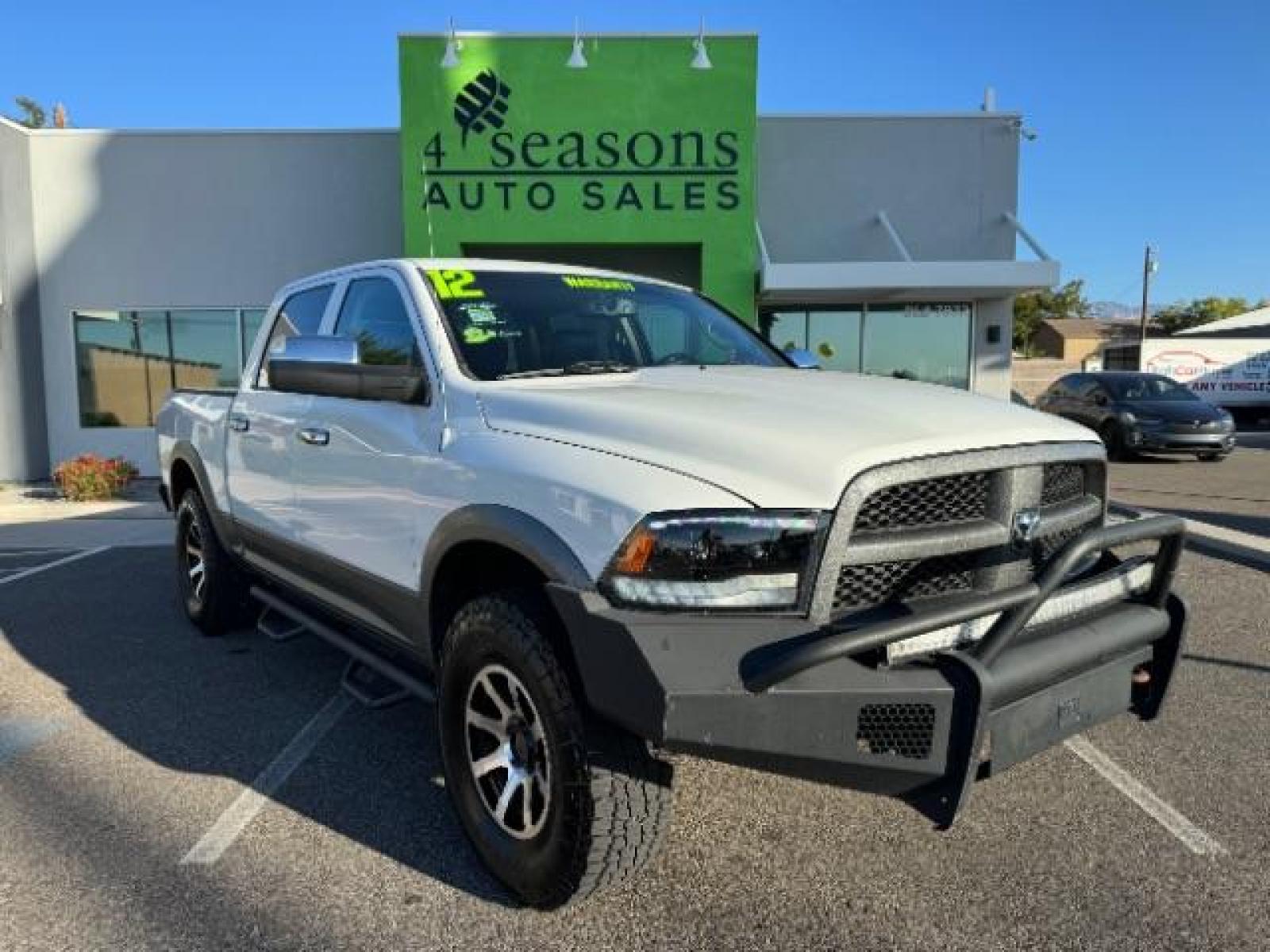 2012 Bright White /Dark Slate Leather Interior RAM 1500 Laramie Crew Cab 4WD (1C6RD7NTXCS) with an 5.7L V8 OHV 16V engine, 6-Speed Automatic transmission, located at 1865 East Red Hills Pkwy, St. George, 84770, (435) 628-0023, 37.120850, -113.543640 - Photo #0