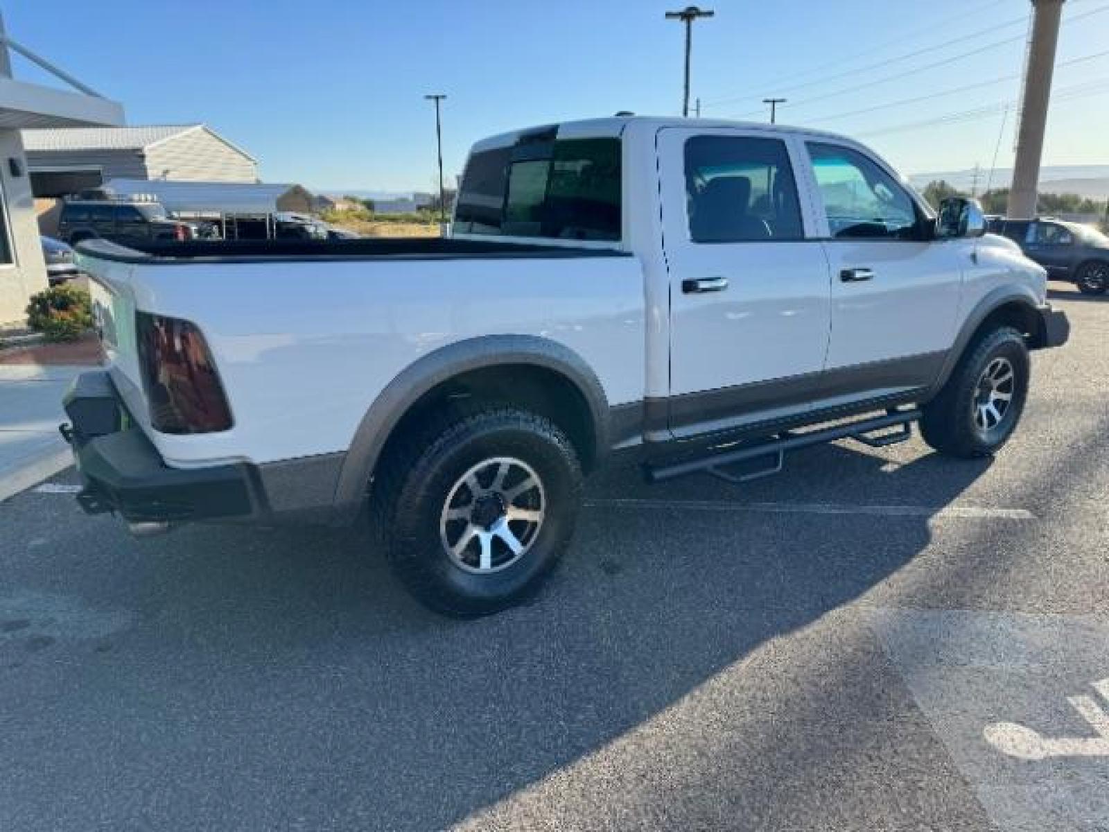 2012 Bright White /Dark Slate Leather Interior RAM 1500 Laramie Crew Cab 4WD (1C6RD7NTXCS) with an 5.7L V8 OHV 16V engine, 6-Speed Automatic transmission, located at 1865 East Red Hills Pkwy, St. George, 84770, (435) 628-0023, 37.120850, -113.543640 - Photo #11