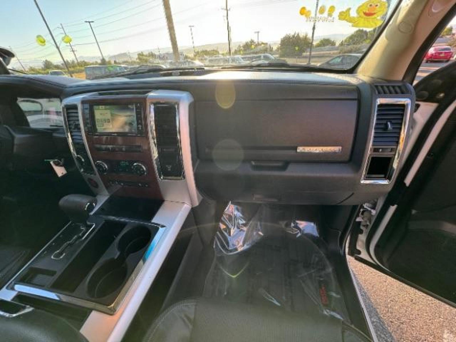 2012 Bright White /Dark Slate Leather Interior RAM 1500 Laramie Crew Cab 4WD (1C6RD7NTXCS) with an 5.7L V8 OHV 16V engine, 6-Speed Automatic transmission, located at 1865 East Red Hills Pkwy, St. George, 84770, (435) 628-0023, 37.120850, -113.543640 - Photo #43