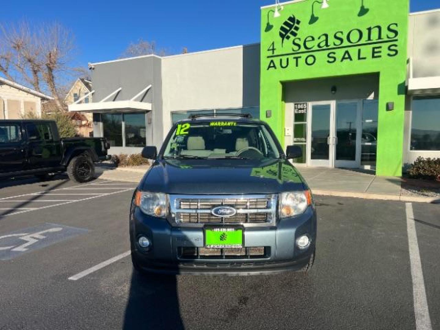 2012 Steel Blue Metallic /Camel Cloth Interior Ford Escape XLT FWD (1FMCU0DG8CK) with an 3.0L V6 DOHC 24V engine, 6-Speed Automatic transmission, located at 940 North Main Street, Cedar City, UT, 84720, (435) 628-0023, 37.692936, -113.061897 - We specialize in helping ALL people get the best financing available. No matter your credit score, good, bad or none we can get you an amazing rate. Had a bankruptcy, divorce, or repossessions? We give you the green light to get your credit back on the road. Low down and affordable payments that fit - Photo#1