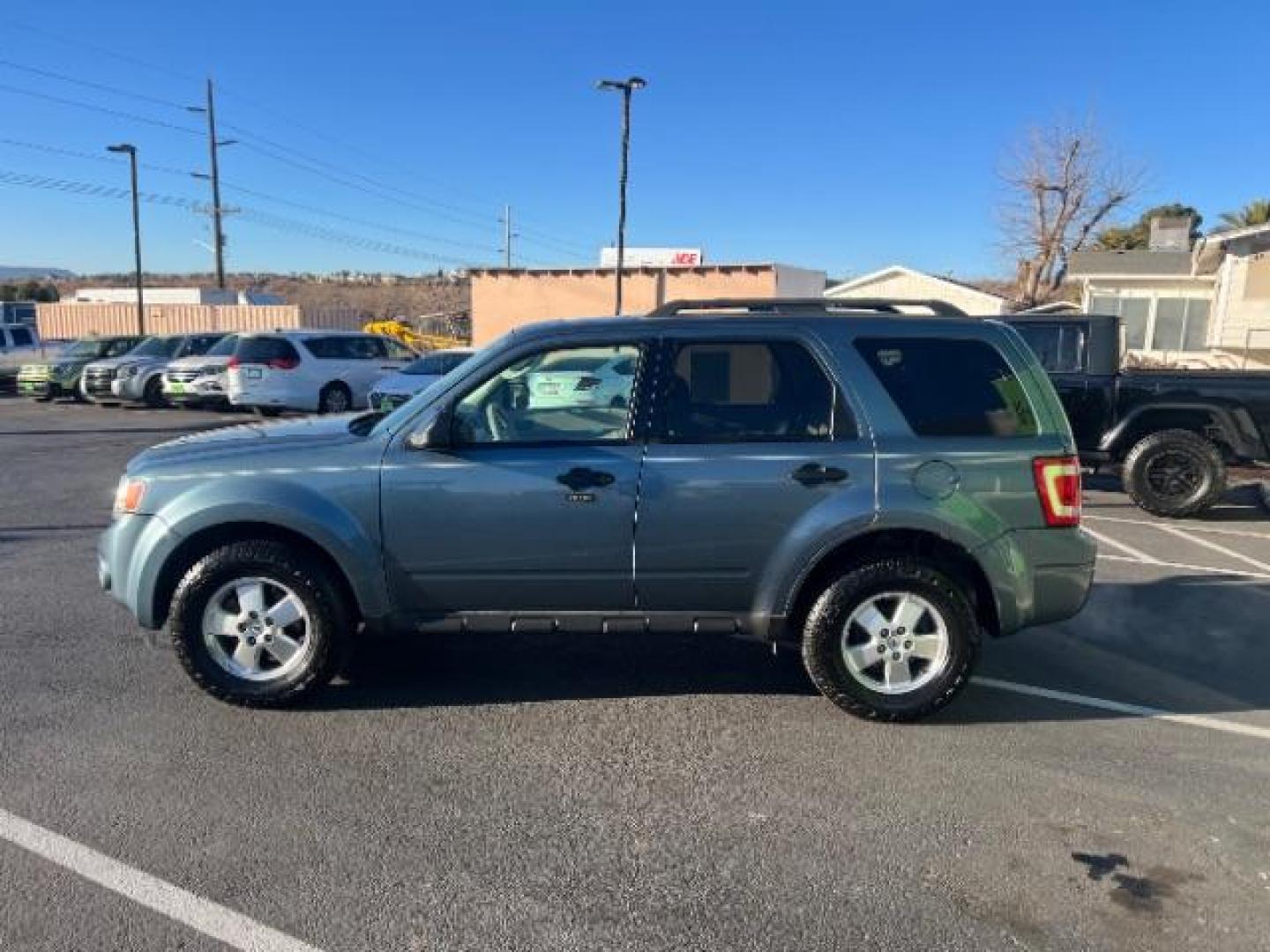 2012 Steel Blue Metallic /Camel Cloth Interior Ford Escape XLT FWD (1FMCU0DG8CK) with an 3.0L V6 DOHC 24V engine, 6-Speed Automatic transmission, located at 940 North Main Street, Cedar City, UT, 84720, (435) 628-0023, 37.692936, -113.061897 - We specialize in helping ALL people get the best financing available. No matter your credit score, good, bad or none we can get you an amazing rate. Had a bankruptcy, divorce, or repossessions? We give you the green light to get your credit back on the road. Low down and affordable payments that fit - Photo#3