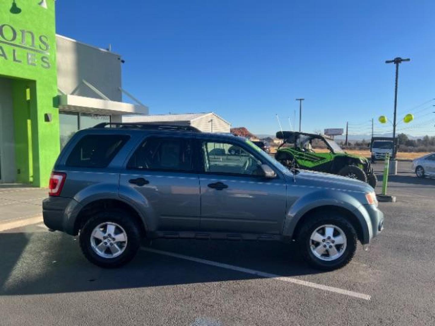 2012 Steel Blue Metallic /Camel Cloth Interior Ford Escape XLT FWD (1FMCU0DG8CK) with an 3.0L V6 DOHC 24V engine, 6-Speed Automatic transmission, located at 940 North Main Street, Cedar City, UT, 84720, (435) 628-0023, 37.692936, -113.061897 - We specialize in helping ALL people get the best financing available. No matter your credit score, good, bad or none we can get you an amazing rate. Had a bankruptcy, divorce, or repossessions? We give you the green light to get your credit back on the road. Low down and affordable payments that fit - Photo#7