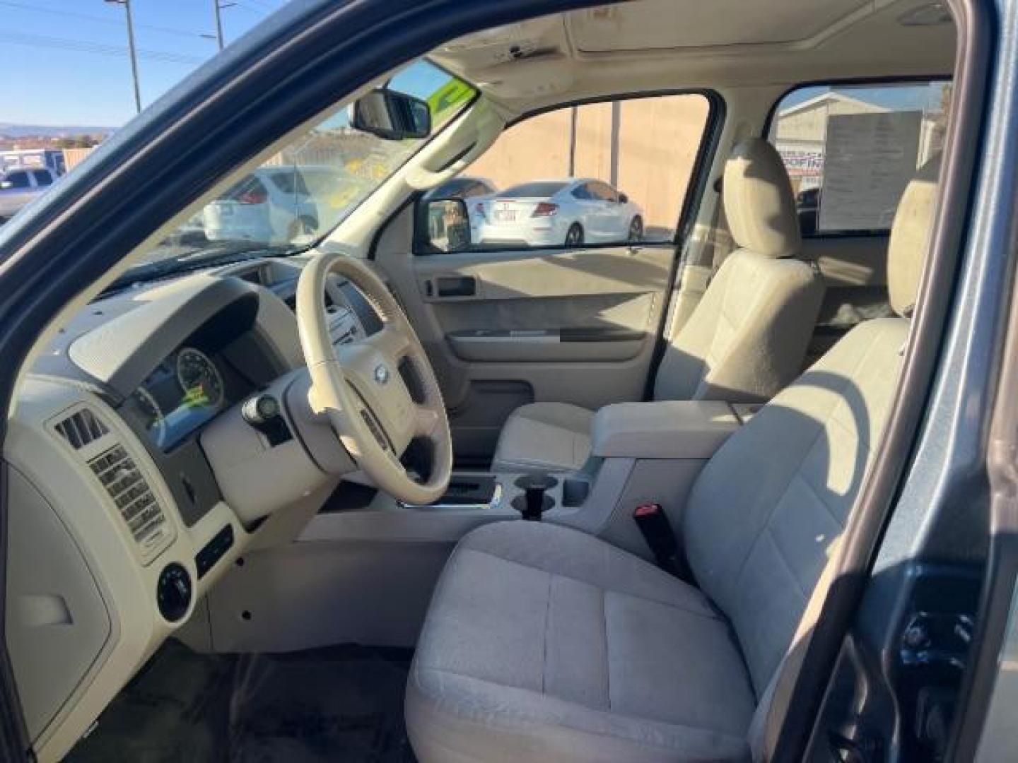 2012 Steel Blue Metallic /Camel Cloth Interior Ford Escape XLT FWD (1FMCU0DG8CK) with an 3.0L V6 DOHC 24V engine, 6-Speed Automatic transmission, located at 940 North Main Street, Cedar City, UT, 84720, (435) 628-0023, 37.692936, -113.061897 - We specialize in helping ALL people get the best financing available. No matter your credit score, good, bad or none we can get you an amazing rate. Had a bankruptcy, divorce, or repossessions? We give you the green light to get your credit back on the road. Low down and affordable payments that fit - Photo#14