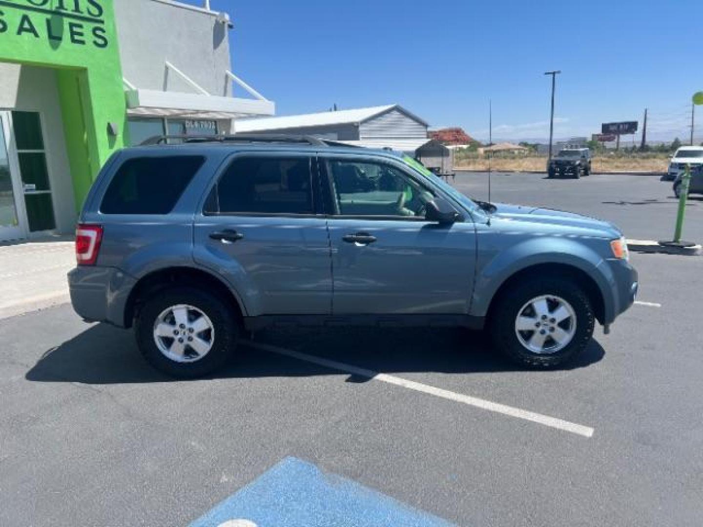 2012 Steel Blue Metallic /Camel Cloth Interior Ford Escape XLT FWD (1FMCU0DG8CK) with an 3.0L V6 DOHC 24V engine, 6-Speed Automatic transmission, located at 1865 East Red Hills Pkwy, St. George, 84770, (435) 628-0023, 37.120850, -113.543640 - Photo#7