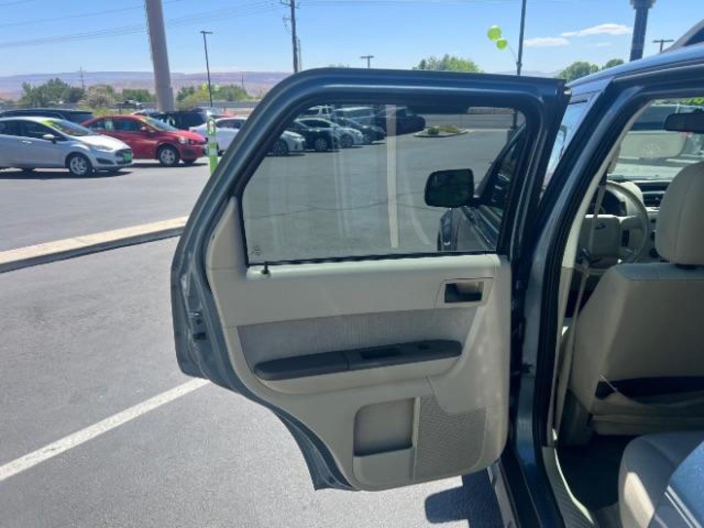 2012 Steel Blue Metallic /Camel Cloth Interior Ford Escape XLT FWD (1FMCU0DG8CK) with an 3.0L V6 DOHC 24V engine, 6-Speed Automatic transmission, located at 1865 East Red Hills Pkwy, St. George, 84770, (435) 628-0023, 37.120850, -113.543640 - Photo#20