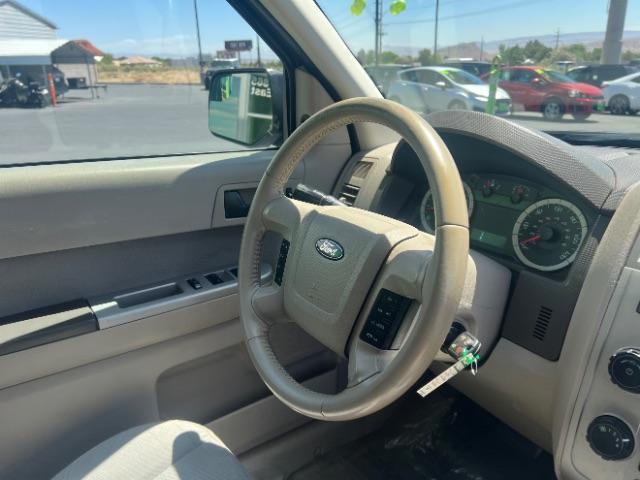 2012 Steel Blue Metallic /Camel Cloth Interior Ford Escape XLT FWD (1FMCU0DG8CK) with an 3.0L V6 DOHC 24V engine, 6-Speed Automatic transmission, located at 1865 East Red Hills Pkwy, St. George, 84770, (435) 628-0023, 37.120850, -113.543640 - We specialize in helping ALL people get the best financing available. No matter your credit score, good, bad or none we can get you an amazing rate. Had a bankruptcy, divorce, or repossessions? We give you the green light to get your credit back on the road. Low down and affordable payments that fit - Photo#29