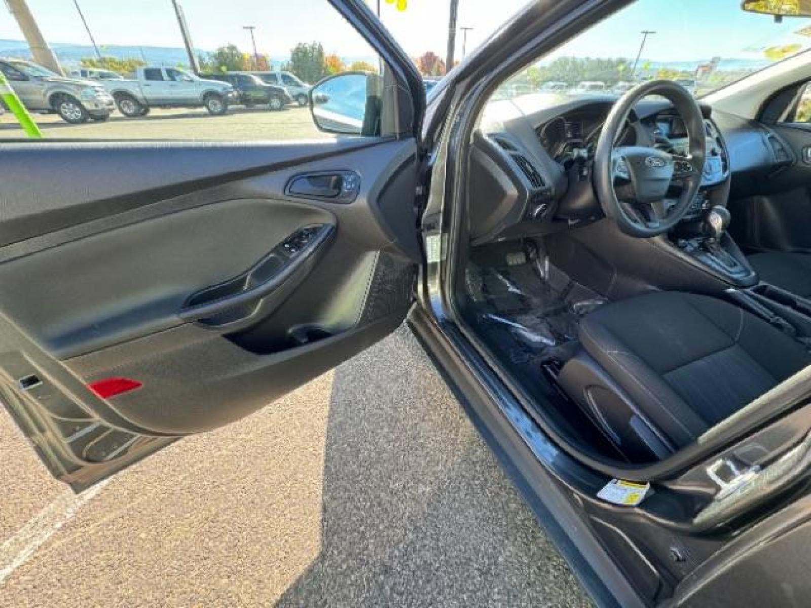 2018 Magnetic Metallic /Charcoal Black Insert w/Warm Steel Surround, cloth Ford Focus S Sedan (1FADP3E24JL) with an 2.0L L4 DOHC 16V engine, 5-Speed Manual transmission, located at 1865 East Red Hills Pkwy, St. George, 84770, (435) 628-0023, 37.120850, -113.543640 - We specialize in helping ALL people get the best financing available. No matter your credit score, good, bad or none we can get you an amazing rate. Had a bankruptcy, divorce, or repossessions? We give you the green light to get your credit back on the road. Low down and affordable payments that fit - Photo #14