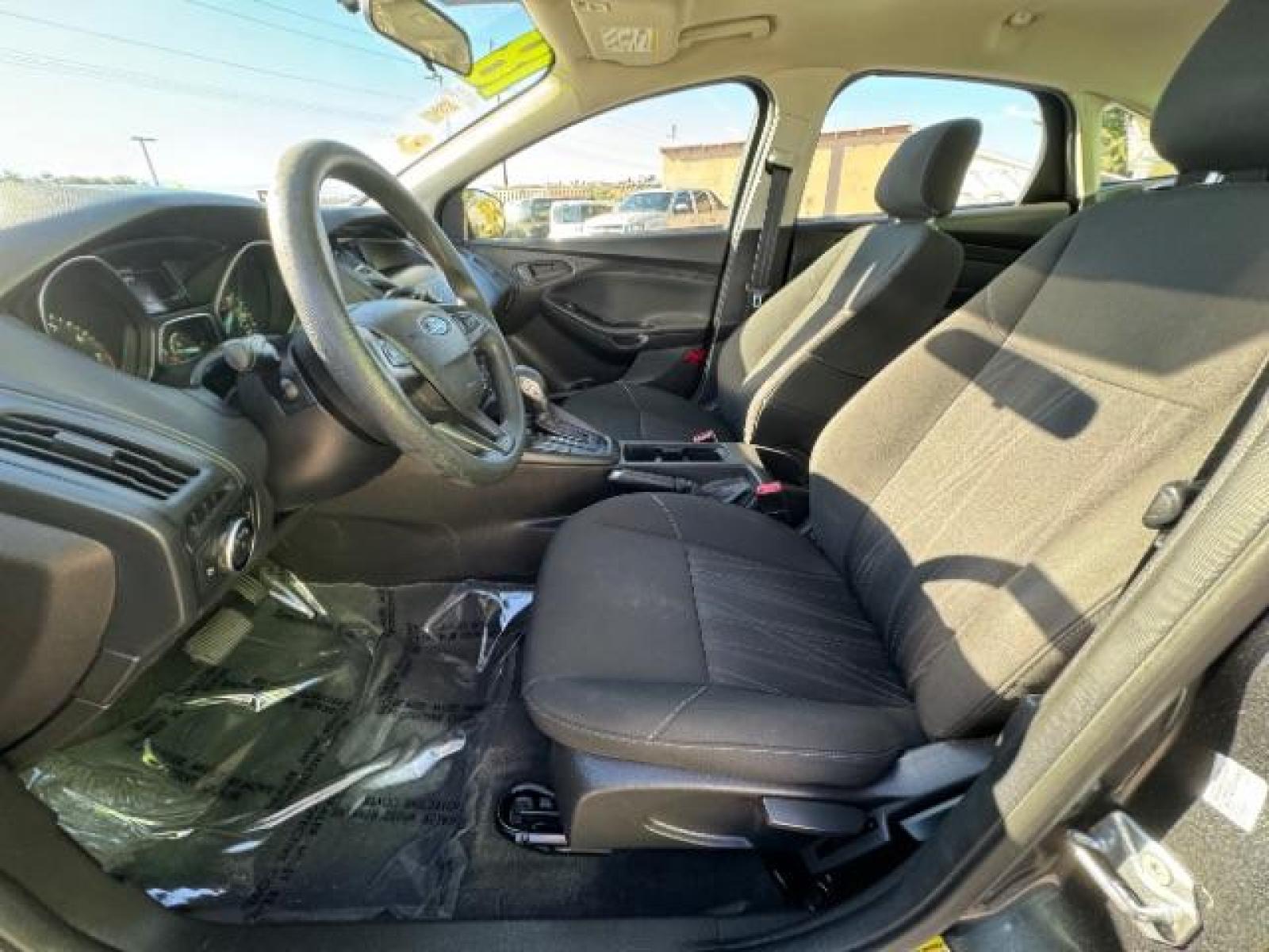 2018 Magnetic Metallic /Charcoal Black Insert w/Warm Steel Surround, cloth Ford Focus S Sedan (1FADP3E24JL) with an 2.0L L4 DOHC 16V engine, 5-Speed Manual transmission, located at 1865 East Red Hills Pkwy, St. George, 84770, (435) 628-0023, 37.120850, -113.543640 - We specialize in helping ALL people get the best financing available. No matter your credit score, good, bad or none we can get you an amazing rate. Had a bankruptcy, divorce, or repossessions? We give you the green light to get your credit back on the road. Low down and affordable payments that fit - Photo #16