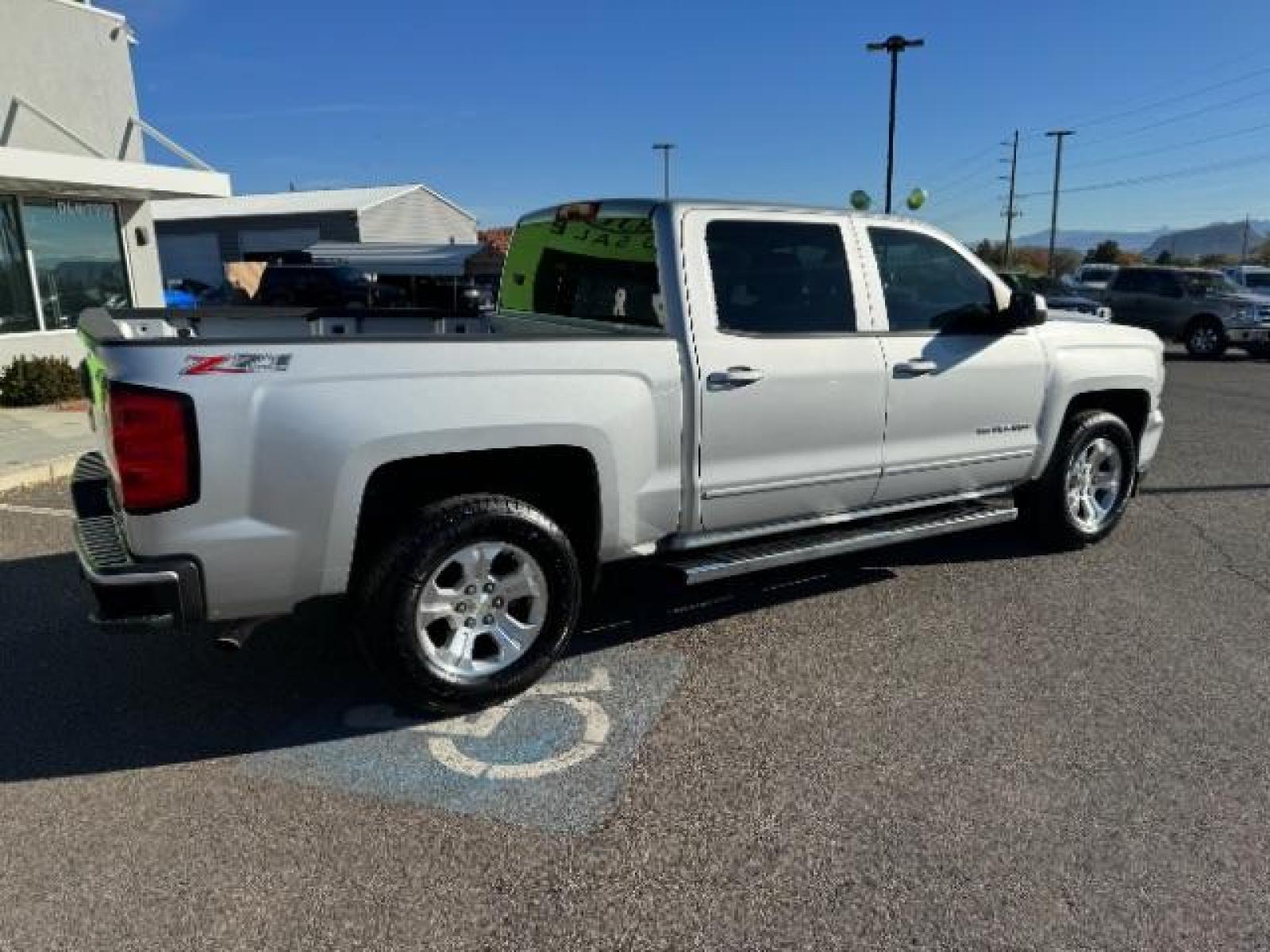2016 Silver Ice Metallic /Dark Ash Seats w/Jet Black Interior Accents, cloth Chevrolet Silverado 1500 LT Crew Cab 4WD (3GCUKREC5GG) with an 5.3L V8 OHV 16V engine, 6-Speed Automatic transmission, located at 1865 East Red Hills Pkwy, St. George, 84770, (435) 628-0023, 37.120850, -113.543640 - We specialize in helping ALL people get the best financing available. No matter your credit score, good, bad or none we can get you an amazing rate. Had a bankruptcy, divorce, or repossessions? We give you the green light to get your credit back on the road. Low down and affordable payments that fit - Photo #10