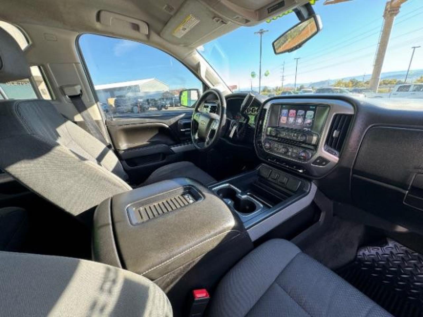 2016 Silver Ice Metallic /Dark Ash Seats w/Jet Black Interior Accents, cloth Chevrolet Silverado 1500 LT Crew Cab 4WD (3GCUKREC5GG) with an 5.3L V8 OHV 16V engine, 6-Speed Automatic transmission, located at 1865 East Red Hills Pkwy, St. George, 84770, (435) 628-0023, 37.120850, -113.543640 - We specialize in helping ALL people get the best financing available. No matter your credit score, good, bad or none we can get you an amazing rate. Had a bankruptcy, divorce, or repossessions? We give you the green light to get your credit back on the road. Low down and affordable payments that fit - Photo #39