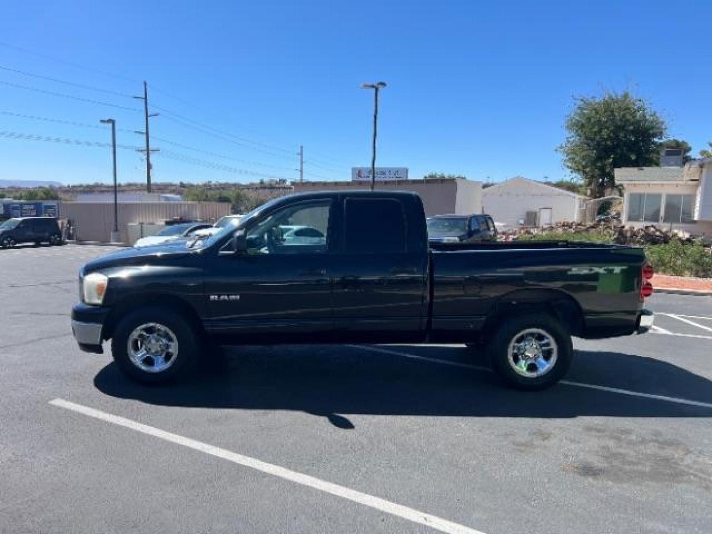 2008 Brilliant Black Crystal Pearl /Medium Slate Gray Cloth Interior Dodge Ram 1500 ST Quad Cab 2WD (1D7HA18K18J) with an 3.7L V6 SOHC 12V engine, 5-Speed Automatic transmission, located at 1865 East Red Hills Pkwy, St. George, 84770, (435) 628-0023, 37.120850, -113.543640 - Photo#3