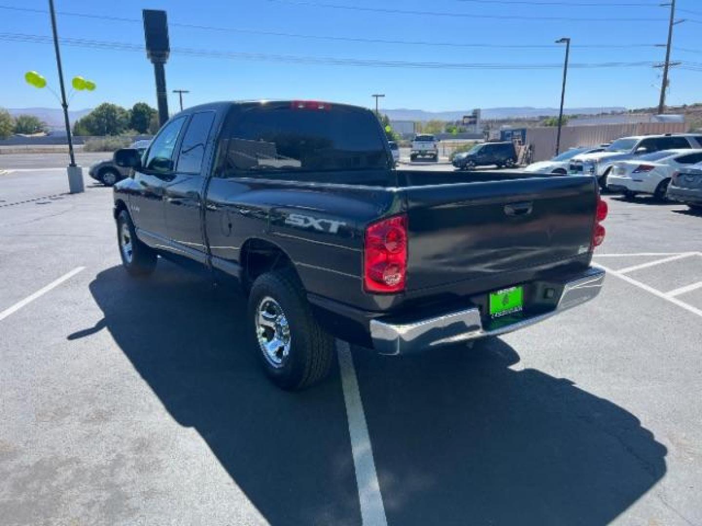 2008 Brilliant Black Crystal Pearl /Medium Slate Gray Cloth Interior Dodge Ram 1500 ST Quad Cab 2WD (1D7HA18K18J) with an 3.7L V6 SOHC 12V engine, 5-Speed Automatic transmission, located at 1865 East Red Hills Pkwy, St. George, 84770, (435) 628-0023, 37.120850, -113.543640 - Photo#4