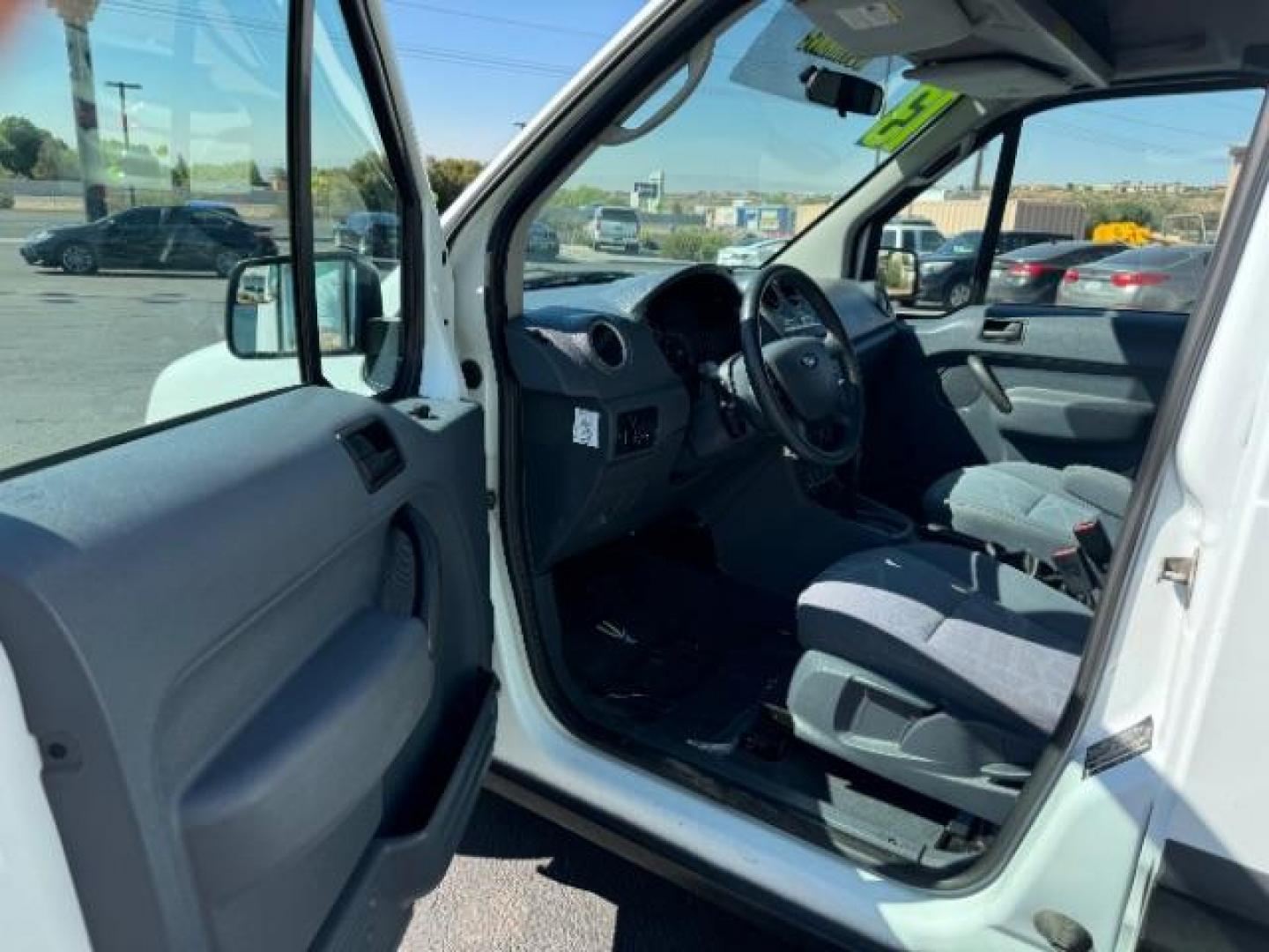 2013 Frozen White /Dark Gray Ford Transit Connect XLT with Side and Re (NM0LS7DN8DT) with an 2.0L L4 DOHC 16V engine, 4-Speed Automatic transmission, located at 1865 East Red Hills Pkwy, St. George, 84770, (435) 628-0023, 37.120850, -113.543640 - We specialize in helping ALL people get the best financing available. No matter your credit score, good, bad or none we can get you an amazing rate. Had a bankruptcy, divorce, or repossessions? We give you the green light to get your credit back on the road. Low down and affordable payments that fit - Photo#12