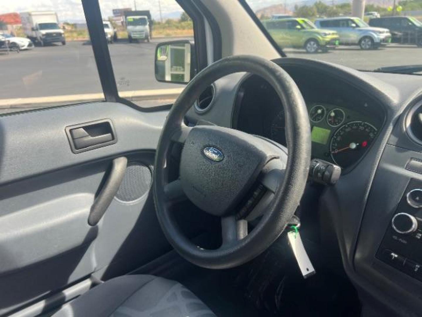 2013 Frozen White /Dark Gray Ford Transit Connect XLT with Side and Rear Door Glass (NM0LS7DN8DT) with an 2.0L L4 DOHC 16V engine, 4-Speed Automatic transmission, located at 1865 East Red Hills Pkwy, St. George, 84770, (435) 628-0023, 37.120850, -113.543640 - We specialize in helping ALL people get the best financing available. No matter your credit score, good, bad or none we can get you an amazing rate. Had a bankruptcy, divorce, or repossessions? We give you the green light to get your credit back on the road. Low down and affordable payments that fit - Photo#28