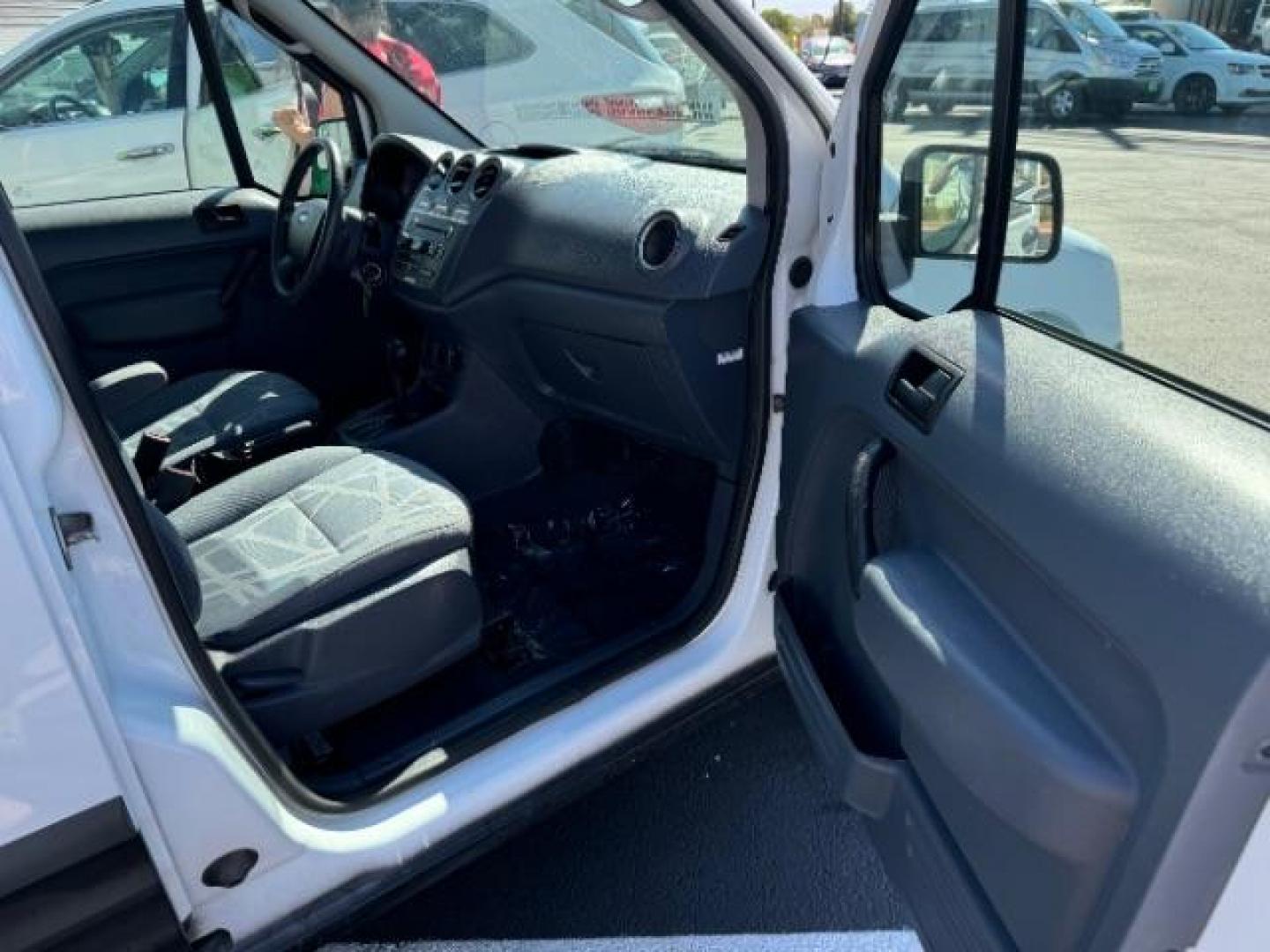 2013 Frozen White /Dark Gray Ford Transit Connect XLT with Side and Re (NM0LS7DN8DT) with an 2.0L L4 DOHC 16V engine, 4-Speed Automatic transmission, located at 1865 East Red Hills Pkwy, St. George, 84770, (435) 628-0023, 37.120850, -113.543640 - We specialize in helping ALL people get the best financing available. No matter your credit score, good, bad or none we can get you an amazing rate. Had a bankruptcy, divorce, or repossessions? We give you the green light to get your credit back on the road. Low down and affordable payments that fit - Photo#27