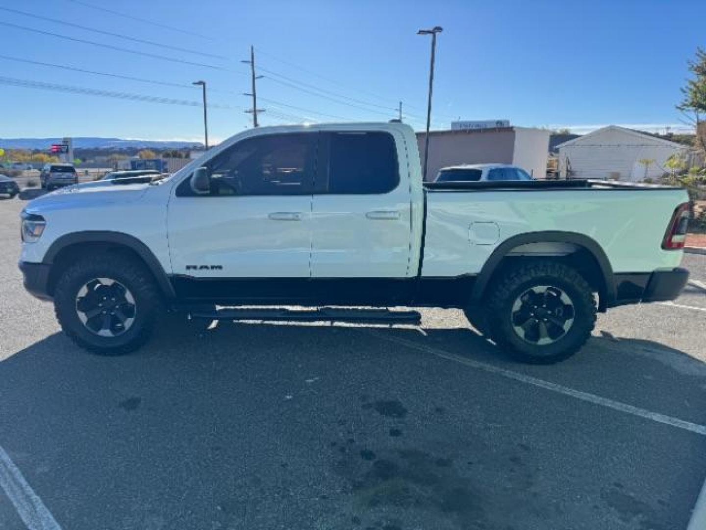 2019 White /Black RAM 1500 Rebel Quad Cab 4WD (1C6RRFEG5KN) with an 3.6L V6 DOHC 24V engine, 8-Speed Automatic transmission, located at 1865 East Red Hills Pkwy, St. George, 84770, (435) 628-0023, 37.120850, -113.543640 - We specialize in helping ALL people get the best financing available. No matter your credit score, good, bad or none we can get you an amazing rate. Had a bankruptcy, divorce, or repossessions? We give you the green light to get your credit back on the road. Low down and affordable payments that fit - Photo#4