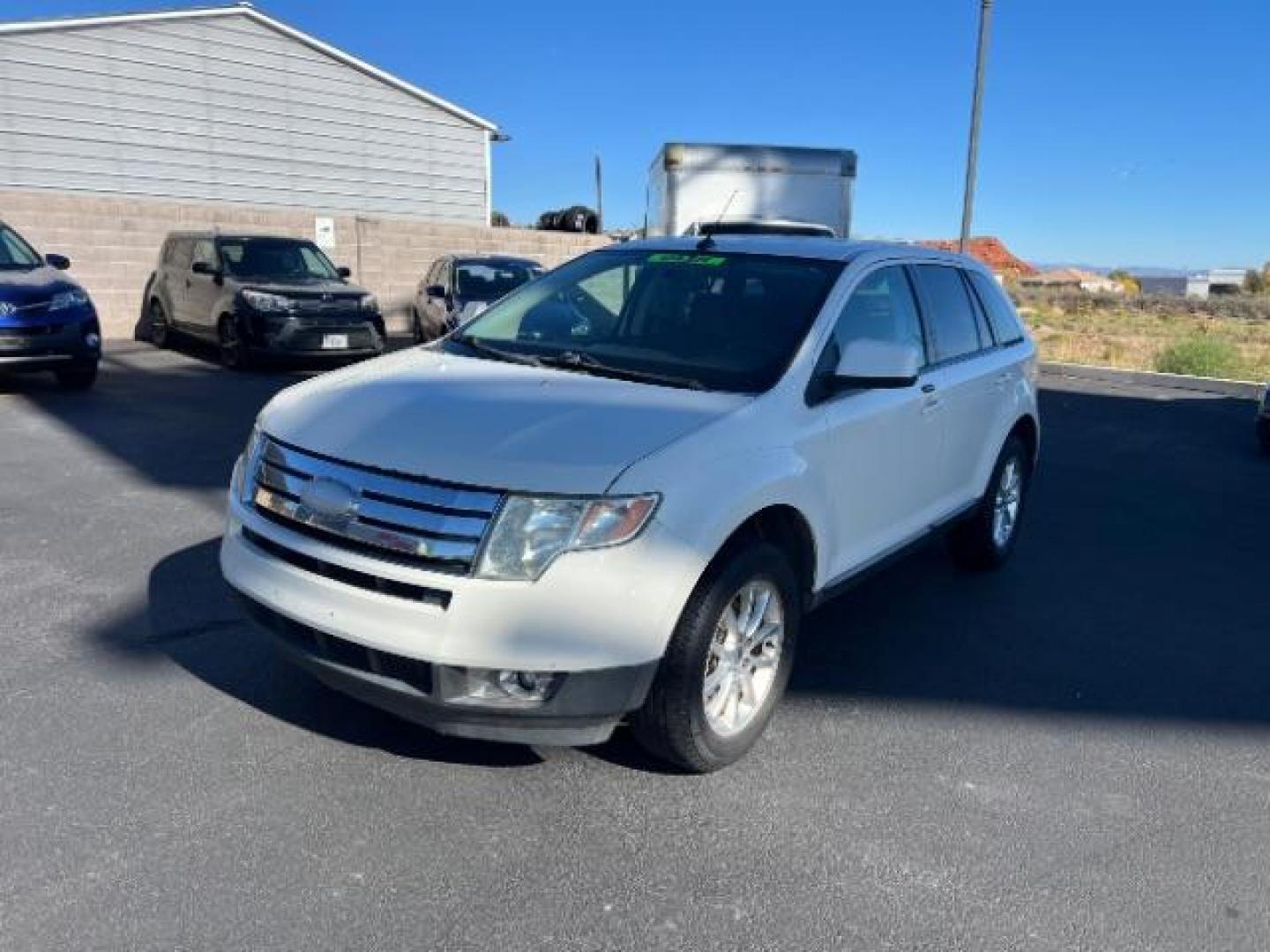 2010 White Platinum Tricoat Metallic /Charcoal Black Cloth Interior Ford Edge SEL AWD (2FMDK4JC9AB) with an 3.5L V6 DOHC 24V engine, 6-Speed Automatic transmission, located at 1865 East Red Hills Pkwy, St. George, 84770, (435) 628-0023, 37.120850, -113.543640 - This vehicle is a Mechanic Special. This means it will need some love. Runs a drives fine but has body damage, leaks or other mechanical issues. It did NOT pass our 50 point inspection. Get a great deal on a less than perfect car. These cars do NOT qualify for our in house financing. Cash and carry, - Photo#2