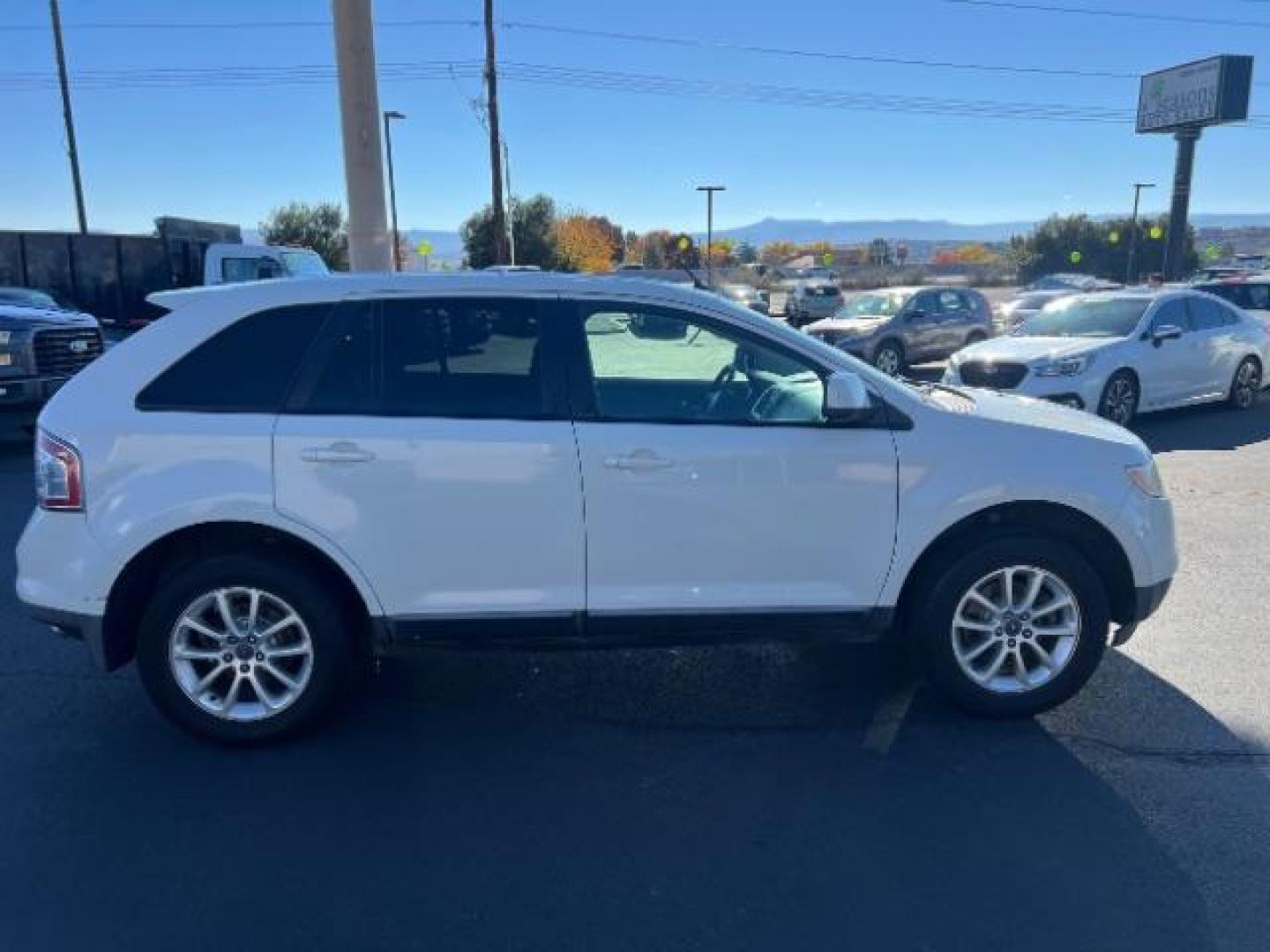 2010 White Platinum Tricoat Metallic /Charcoal Black Cloth Interior Ford Edge SEL AWD (2FMDK4JC9AB) with an 3.5L V6 DOHC 24V engine, 6-Speed Automatic transmission, located at 1865 East Red Hills Pkwy, St. George, 84770, (435) 628-0023, 37.120850, -113.543640 - This vehicle is a Mechanic Special. This means it will need some love. Runs a drives fine but has body damage, leaks or other mechanical issues. It did NOT pass our 50 point inspection. Get a great deal on a less than perfect car. These cars do NOT qualify for our in house financing. Cash and carry, - Photo#7