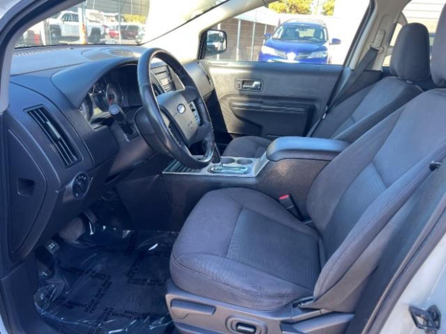 2010 White Platinum Tricoat Metallic /Charcoal Black Cloth Interior Ford Edge SEL AWD (2FMDK4JC9AB) with an 3.5L V6 DOHC 24V engine, 6-Speed Automatic transmission, located at 1865 East Red Hills Pkwy, St. George, 84770, (435) 628-0023, 37.120850, -113.543640 - This vehicle is a Mechanic Special. This means it will need some love. Runs a drives fine but has body damage, leaks or other mechanical issues. It did NOT pass our 50 point inspection. Get a great deal on a less than perfect car. These cars do NOT qualify for our in house financing. Cash and carry, - Photo#10