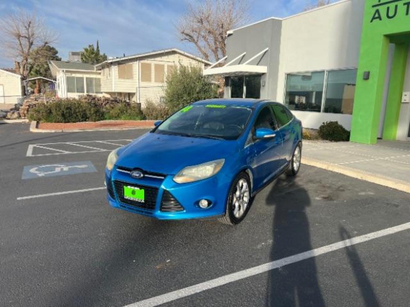 2014 Blue Candy Tinted CC /Charcoal Black Ford Focus Titanium Sedan (1FADP3J2XEL) with an 2.0L L4 DOHC 16V engine, 6-Speed Automatic transmission, located at 1865 East Red Hills Pkwy, St. George, 84770, (435) 628-0023, 37.120850, -113.543640 - We specialize in helping ALL people get the best financing available. No matter your credit score, good, bad or none we can get you an amazing rate. Had a bankruptcy, divorce, or repossessions? We give you the green light to get your credit back on the road. Low down and affordable payments that fit - Photo#2