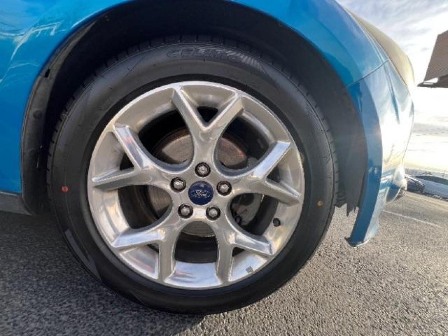 2014 Blue Candy Tinted CC /Charcoal Black Ford Focus Titanium Sedan (1FADP3J2XEL) with an 2.0L L4 DOHC 16V engine, 6-Speed Automatic transmission, located at 1865 East Red Hills Pkwy, St. George, 84770, (435) 628-0023, 37.120850, -113.543640 - We specialize in helping ALL people get the best financing available. No matter your credit score, good, bad or none we can get you an amazing rate. Had a bankruptcy, divorce, or repossessions? We give you the green light to get your credit back on the road. Low down and affordable payments that fit - Photo#9