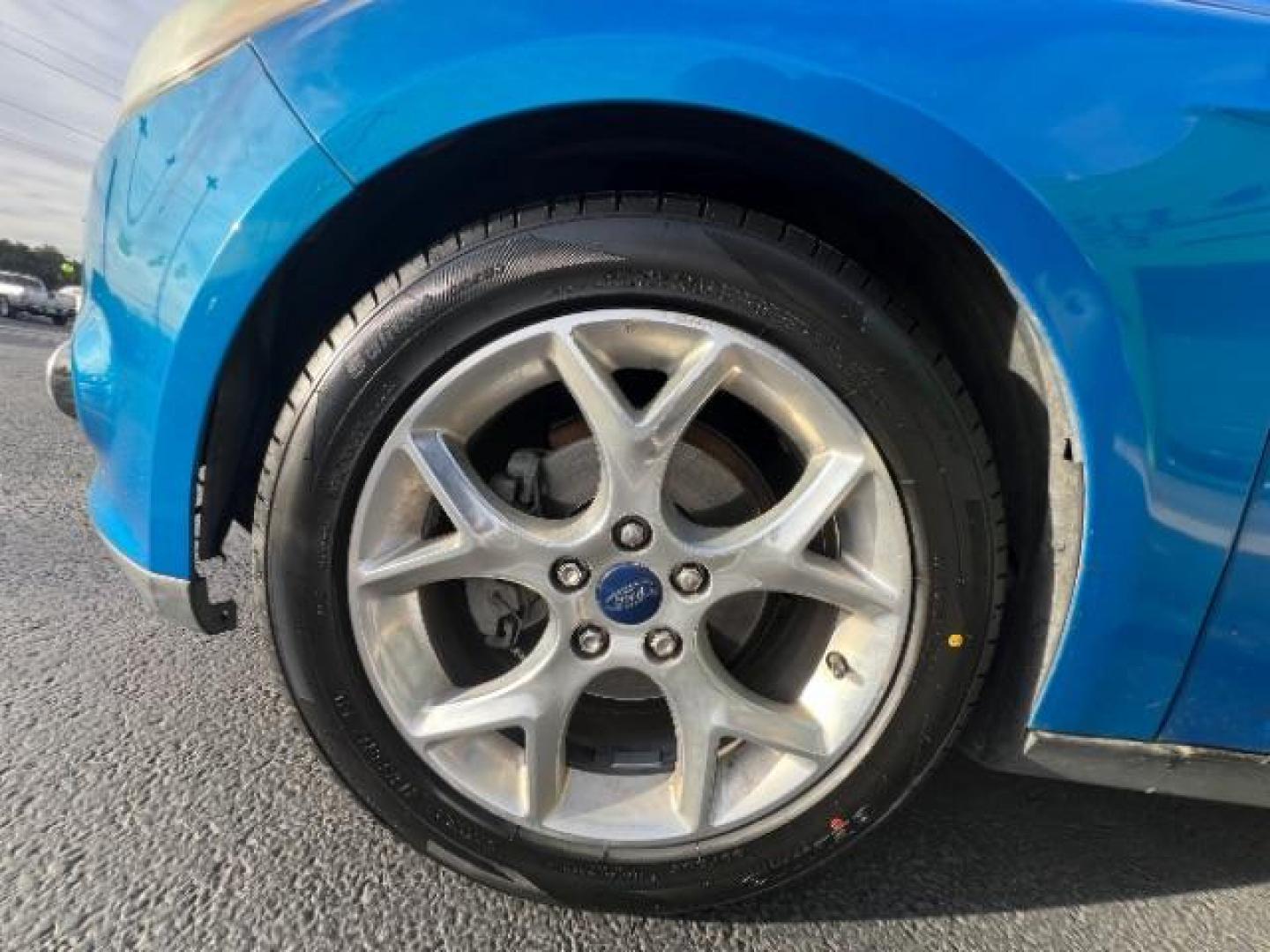 2014 Blue Candy Tinted CC /Charcoal Black Ford Focus Titanium Sedan (1FADP3J2XEL) with an 2.0L L4 DOHC 16V engine, 6-Speed Automatic transmission, located at 1865 East Red Hills Pkwy, St. George, 84770, (435) 628-0023, 37.120850, -113.543640 - We specialize in helping ALL people get the best financing available. No matter your credit score, good, bad or none we can get you an amazing rate. Had a bankruptcy, divorce, or repossessions? We give you the green light to get your credit back on the road. Low down and affordable payments that fit - Photo#10