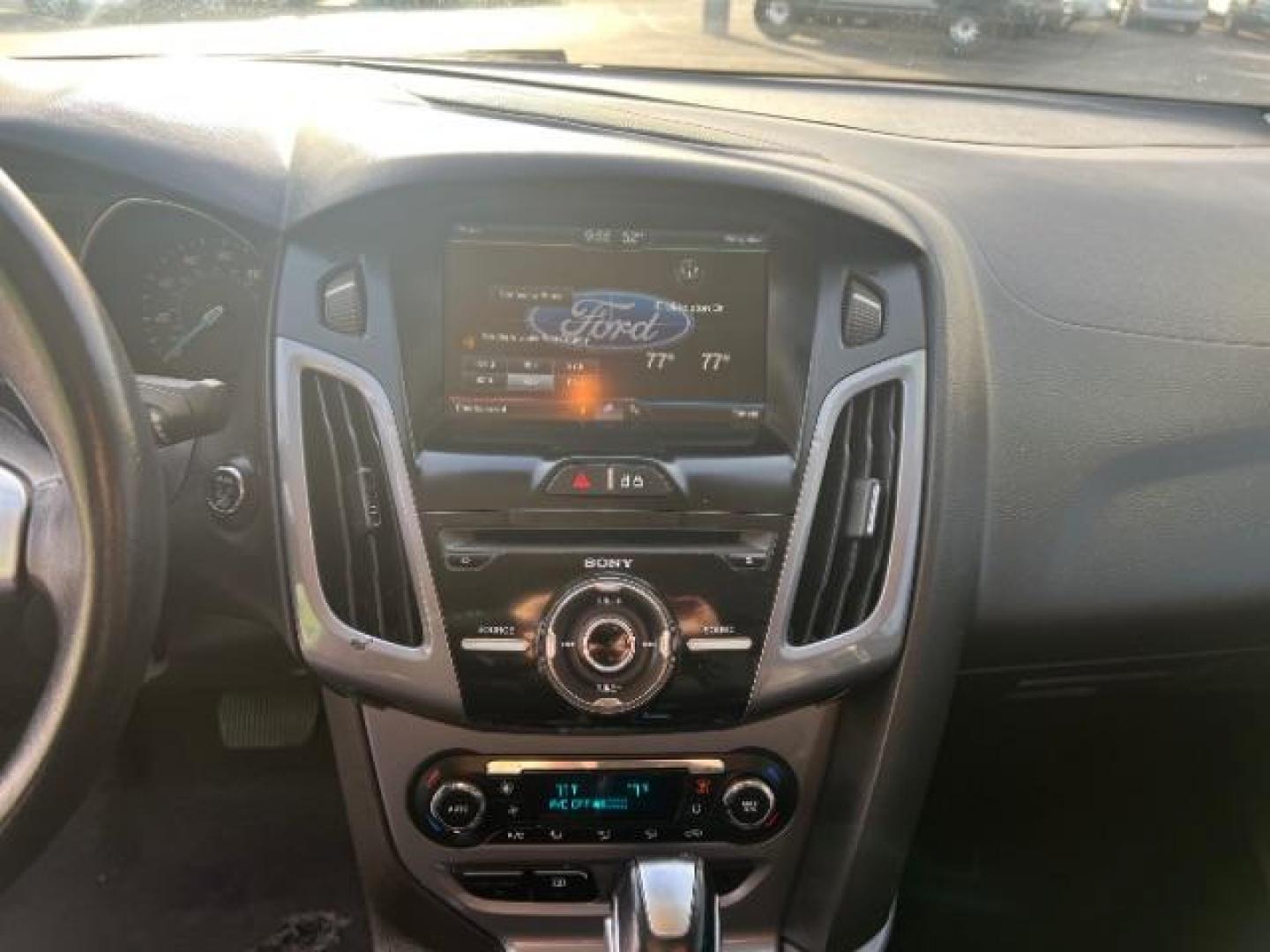 2014 Blue Candy Tinted CC /Charcoal Black Ford Focus Titanium Sedan (1FADP3J2XEL) with an 2.0L L4 DOHC 16V engine, 6-Speed Automatic transmission, located at 1865 East Red Hills Pkwy, St. George, 84770, (435) 628-0023, 37.120850, -113.543640 - We specialize in helping ALL people get the best financing available. No matter your credit score, good, bad or none we can get you an amazing rate. Had a bankruptcy, divorce, or repossessions? We give you the green light to get your credit back on the road. Low down and affordable payments that fit - Photo#17