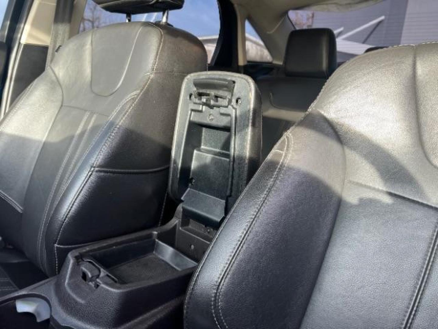 2014 Blue Candy Tinted CC /Charcoal Black Ford Focus Titanium Sedan (1FADP3J2XEL) with an 2.0L L4 DOHC 16V engine, 6-Speed Automatic transmission, located at 1865 East Red Hills Pkwy, St. George, 84770, (435) 628-0023, 37.120850, -113.543640 - We specialize in helping ALL people get the best financing available. No matter your credit score, good, bad or none we can get you an amazing rate. Had a bankruptcy, divorce, or repossessions? We give you the green light to get your credit back on the road. Low down and affordable payments that fit - Photo#19