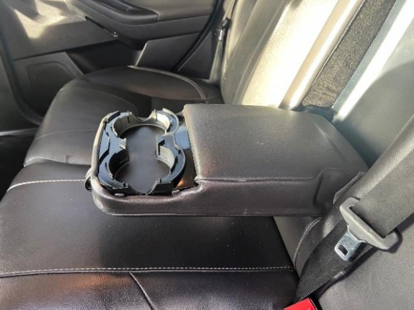 2014 Blue Candy Tinted CC /Charcoal Black Ford Focus Titanium Sedan (1FADP3J2XEL) with an 2.0L L4 DOHC 16V engine, 6-Speed Automatic transmission, located at 1865 East Red Hills Pkwy, St. George, 84770, (435) 628-0023, 37.120850, -113.543640 - We specialize in helping ALL people get the best financing available. No matter your credit score, good, bad or none we can get you an amazing rate. Had a bankruptcy, divorce, or repossessions? We give you the green light to get your credit back on the road. Low down and affordable payments that fit - Photo#22