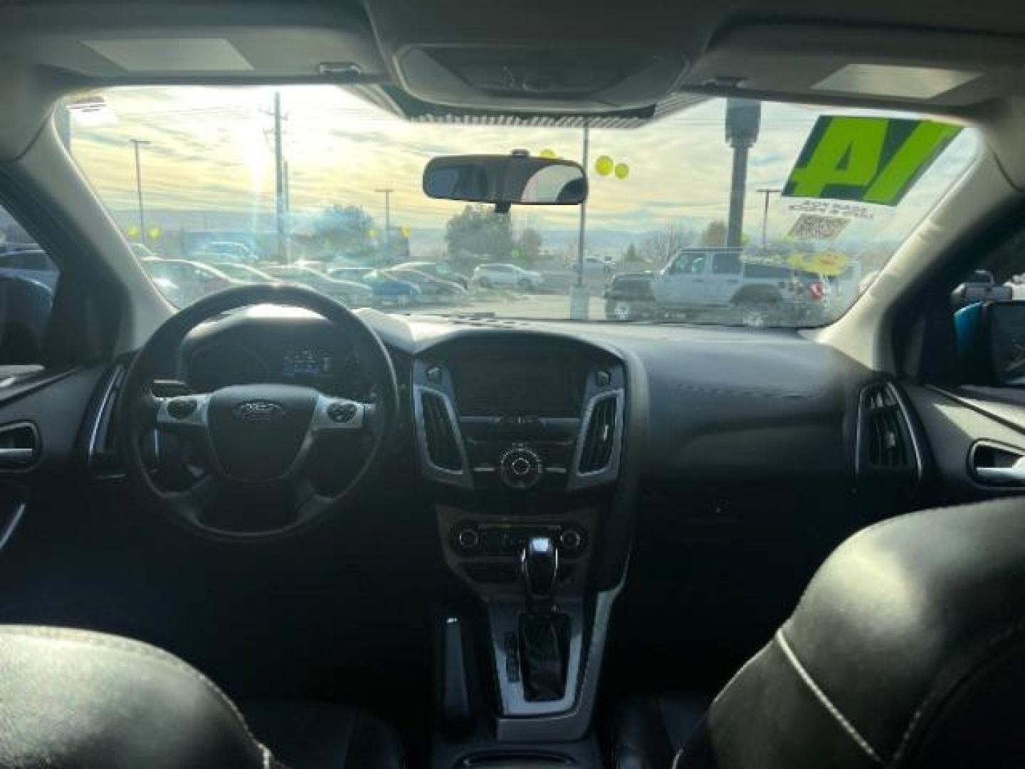 2014 Blue Candy Tinted CC /Charcoal Black Ford Focus Titanium Sedan (1FADP3J2XEL) with an 2.0L L4 DOHC 16V engine, 6-Speed Automatic transmission, located at 1865 East Red Hills Pkwy, St. George, 84770, (435) 628-0023, 37.120850, -113.543640 - We specialize in helping ALL people get the best financing available. No matter your credit score, good, bad or none we can get you an amazing rate. Had a bankruptcy, divorce, or repossessions? We give you the green light to get your credit back on the road. Low down and affordable payments that fit - Photo#23