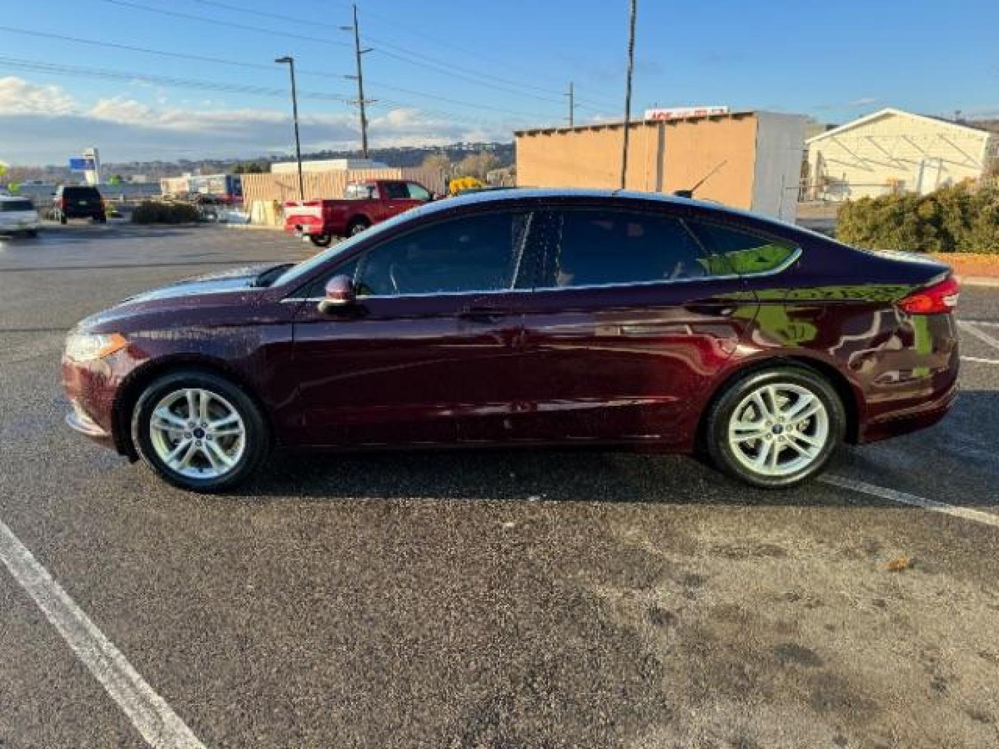 2018 Burgundy Velvet Metallic Tinted Clearcoat /Medium Light Stone, cloth Ford Fusion SE (3FA6P0H75JR) with an 2.5L L4 DOHC 16V engine, 6-Speed Automatic transmission, located at 1865 East Red Hills Pkwy, St. George, 84770, (435) 628-0023, 37.120850, -113.543640 - We specialize in helping ALL people get the best financing available. No matter your credit score, good, bad or none we can get you an amazing rate. Had a bankruptcy, divorce, or repossessions? We give you the green light to get your credit back on the road. Low down and affordable payments that fit - Photo#5