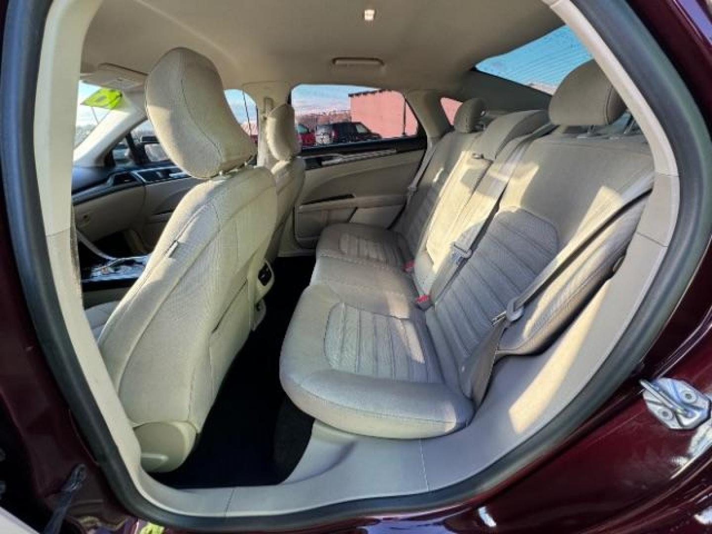2018 Burgundy Velvet Metallic Tinted Clearcoat /Medium Light Stone, cloth Ford Fusion SE (3FA6P0H75JR) with an 2.5L L4 DOHC 16V engine, 6-Speed Automatic transmission, located at 1865 East Red Hills Pkwy, St. George, 84770, (435) 628-0023, 37.120850, -113.543640 - We specialize in helping ALL people get the best financing available. No matter your credit score, good, bad or none we can get you an amazing rate. Had a bankruptcy, divorce, or repossessions? We give you the green light to get your credit back on the road. Low down and affordable payments that fit - Photo#28