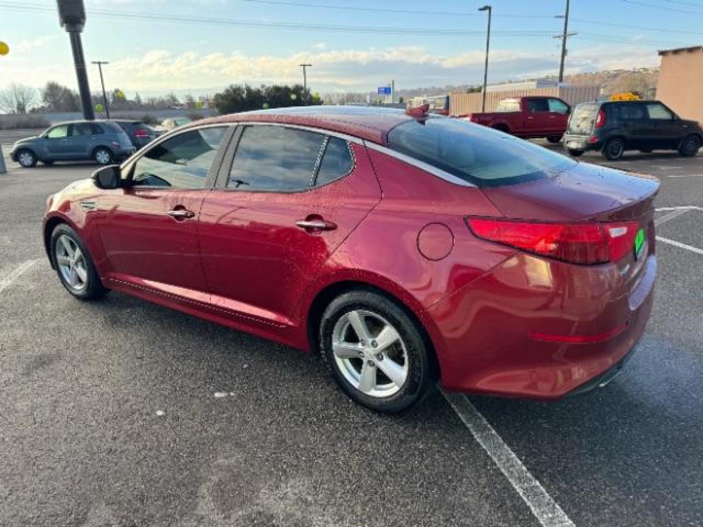 2015 Dark Cherry /Black Kia Optima LX (5XXGM4A78FG) with an 2.4L L4 DOHC 16V engine, 6-Speed Automatic transmission, located at 1865 East Red Hills Pkwy, St. George, 84770, (435) 628-0023, 37.120850, -113.543640 - Photo#6
