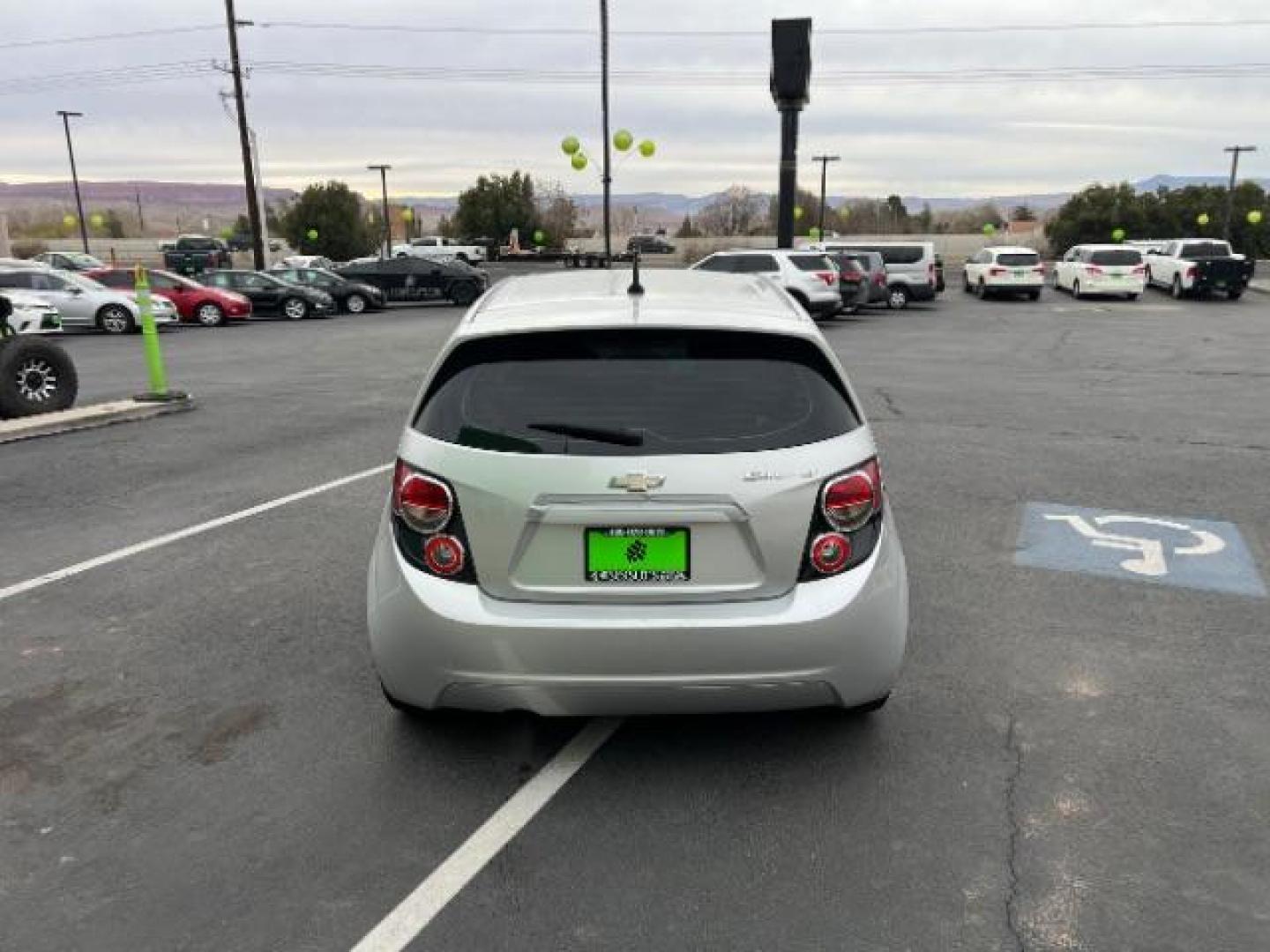 2014 Silver Ice Metallic /Dark Pewter/Dark Titanium Chevrolet Sonic LT Auto 5-Door (1G1JC6SH0E4) with an 1.8L L4 DOHC 24V engine, 6-Speed Automatic transmission, located at 940 North Main Street, Cedar City, UT, 84720, (435) 628-0023, 37.692936, -113.061897 - Photo#5