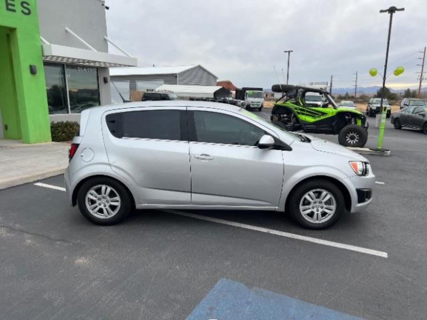 2014 Silver Ice Metallic /Dark Pewter/Dark Titanium Chevrolet Sonic LT Auto 5-Door (1G1JC6SH0E4) with an 1.8L L4 DOHC 24V engine, 6-Speed Automatic transmission, located at 940 North Main Street, Cedar City, UT, 84720, (435) 628-0023, 37.692936, -113.061897 - Photo#7