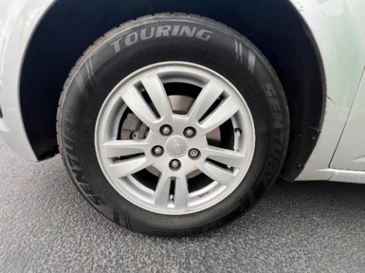 2014 Silver Ice Metallic /Dark Pewter/Dark Titanium Chevrolet Sonic LT Auto 5-Door (1G1JC6SH0E4) with an 1.8L L4 DOHC 24V engine, 6-Speed Automatic transmission, located at 940 North Main Street, Cedar City, UT, 84720, (435) 628-0023, 37.692936, -113.061897 - Photo#9