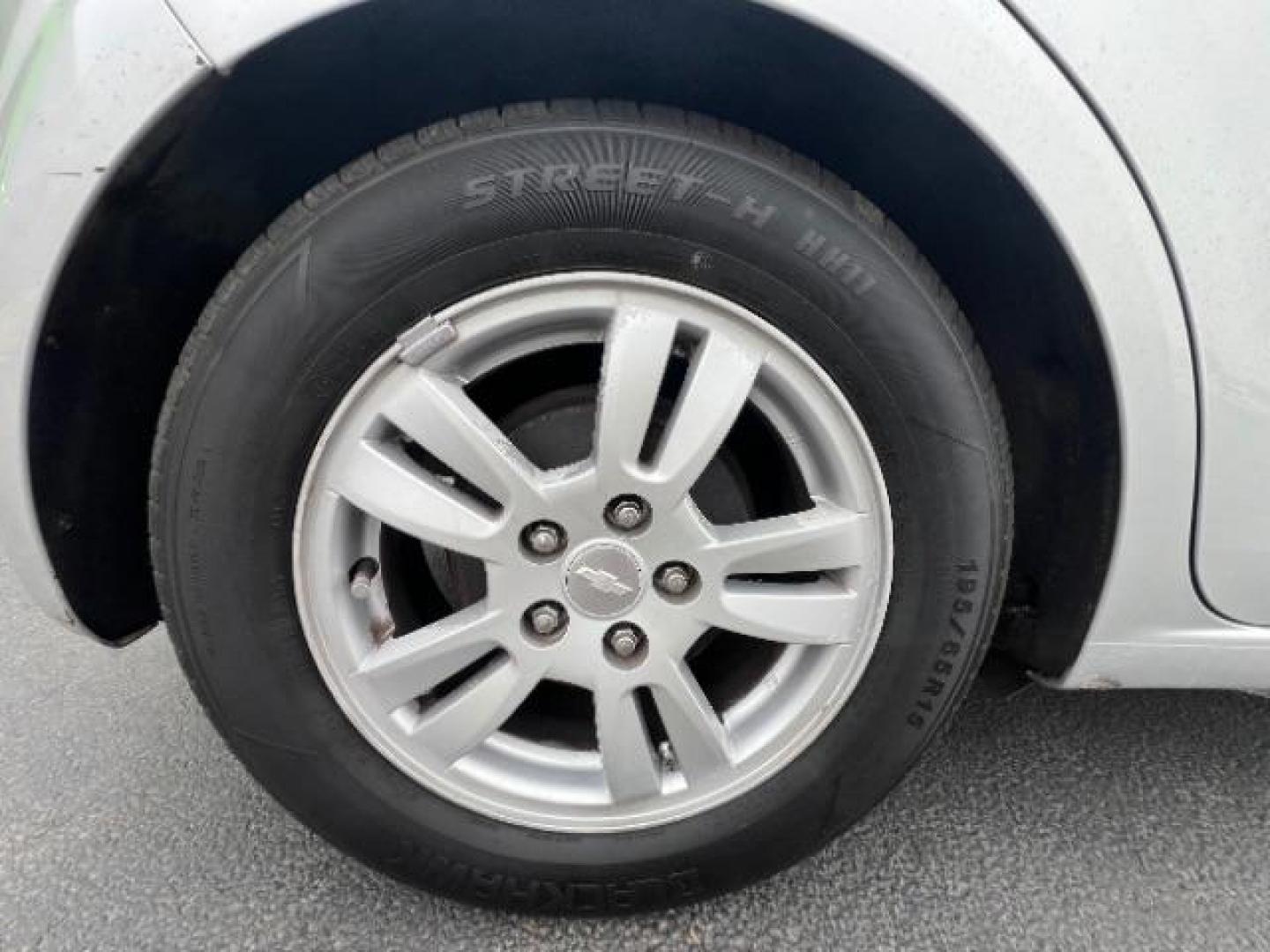 2014 Silver Ice Metallic /Dark Pewter/Dark Titanium Chevrolet Sonic LT Auto 5-Door (1G1JC6SH0E4) with an 1.8L L4 DOHC 24V engine, 6-Speed Automatic transmission, located at 940 North Main Street, Cedar City, UT, 84720, (435) 628-0023, 37.692936, -113.061897 - Photo#11