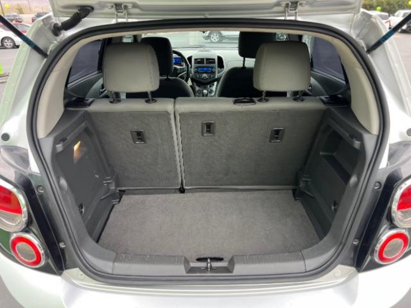 2014 Silver Ice Metallic /Dark Pewter/Dark Titanium Chevrolet Sonic LT Auto 5-Door (1G1JC6SH0E4) with an 1.8L L4 DOHC 24V engine, 6-Speed Automatic transmission, located at 940 North Main Street, Cedar City, UT, 84720, (435) 628-0023, 37.692936, -113.061897 - Photo#23