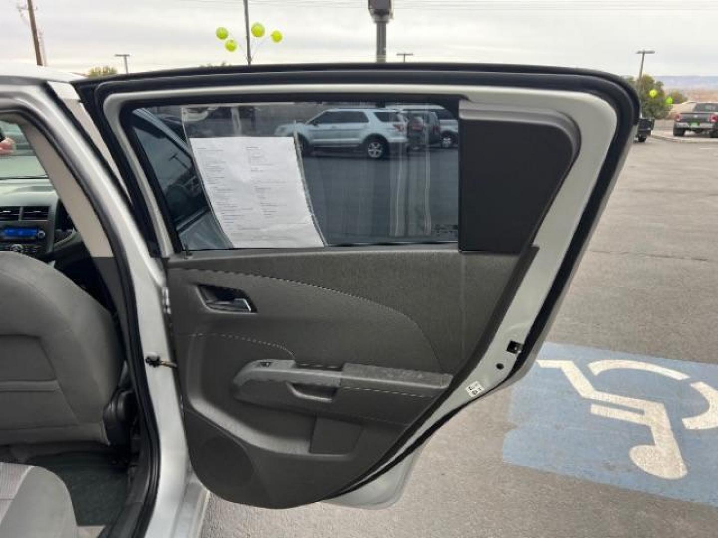 2014 Silver Ice Metallic /Dark Pewter/Dark Titanium Chevrolet Sonic LT Auto 5-Door (1G1JC6SH0E4) with an 1.8L L4 DOHC 24V engine, 6-Speed Automatic transmission, located at 940 North Main Street, Cedar City, UT, 84720, (435) 628-0023, 37.692936, -113.061897 - Photo#24