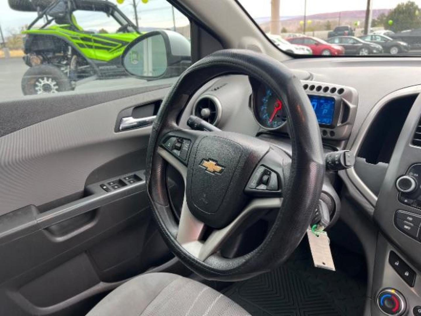 2014 Silver Ice Metallic /Dark Pewter/Dark Titanium Chevrolet Sonic LT Auto 5-Door (1G1JC6SH0E4) with an 1.8L L4 DOHC 24V engine, 6-Speed Automatic transmission, located at 940 North Main Street, Cedar City, UT, 84720, (435) 628-0023, 37.692936, -113.061897 - Photo#29