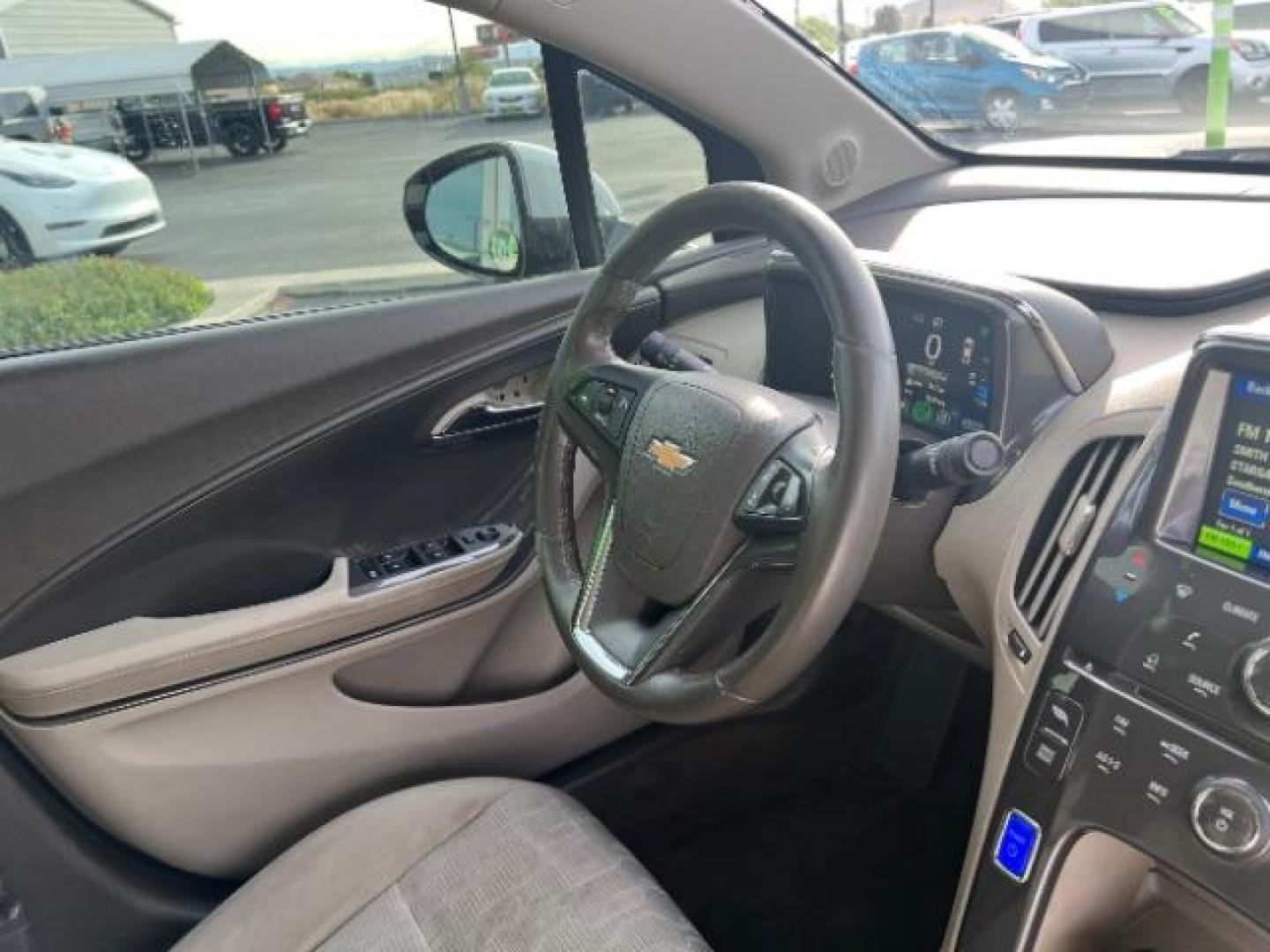 2015 Summit White /Pebble Beige/Dark Accents Chevrolet Volt Standard w/ Navigation (1G1RC6E45FU) with an ELECTRIC engine, Continuously Variable Transmission transmission, located at 1865 East Red Hills Pkwy, St. George, 84770, (435) 628-0023, 37.120850, -113.543640 - We specialize in helping ALL people get the best financing available. No matter your credit score, good, bad or none we can get you an amazing rate. Had a bankruptcy, divorce, or repossessions? We give you the green light to get your credit back on the road. Low down and affordable payments that fit - Photo#30