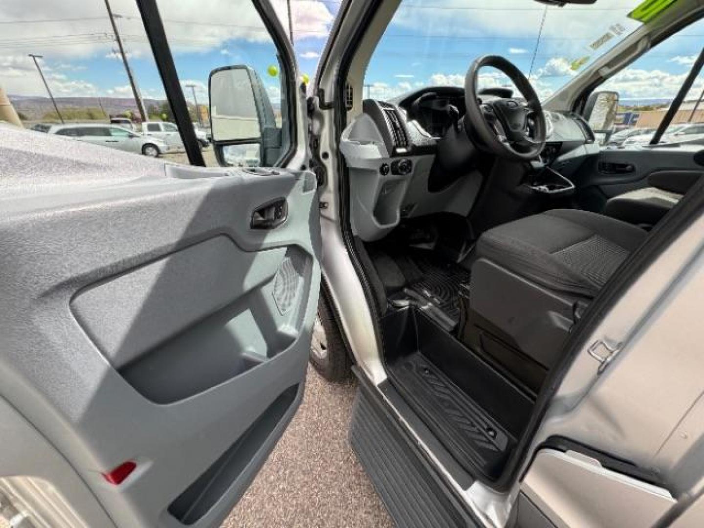 2018 Silver /Black Interior Ford Transit 350 Wagon Low Roof XL w/Sliding Pass. 148-in. WB (1FBZX2YM9JK) with an 3.7L V6 DOHC 24V engine, 6-Speed Automatic transmission, located at 940 North Main Street, Cedar City, UT, 84720, (435) 628-0023, 37.692936, -113.061897 - The 2018 Ford Transit Wagon XLT is the ultimate people mover, built for comfort and versatility. With its spacious interior and flexible seating configuration, this full-size van is perfect for families, businesses, or road trip enthusiasts. The high-roof design allows for easy entry and exit, while - Photo#16